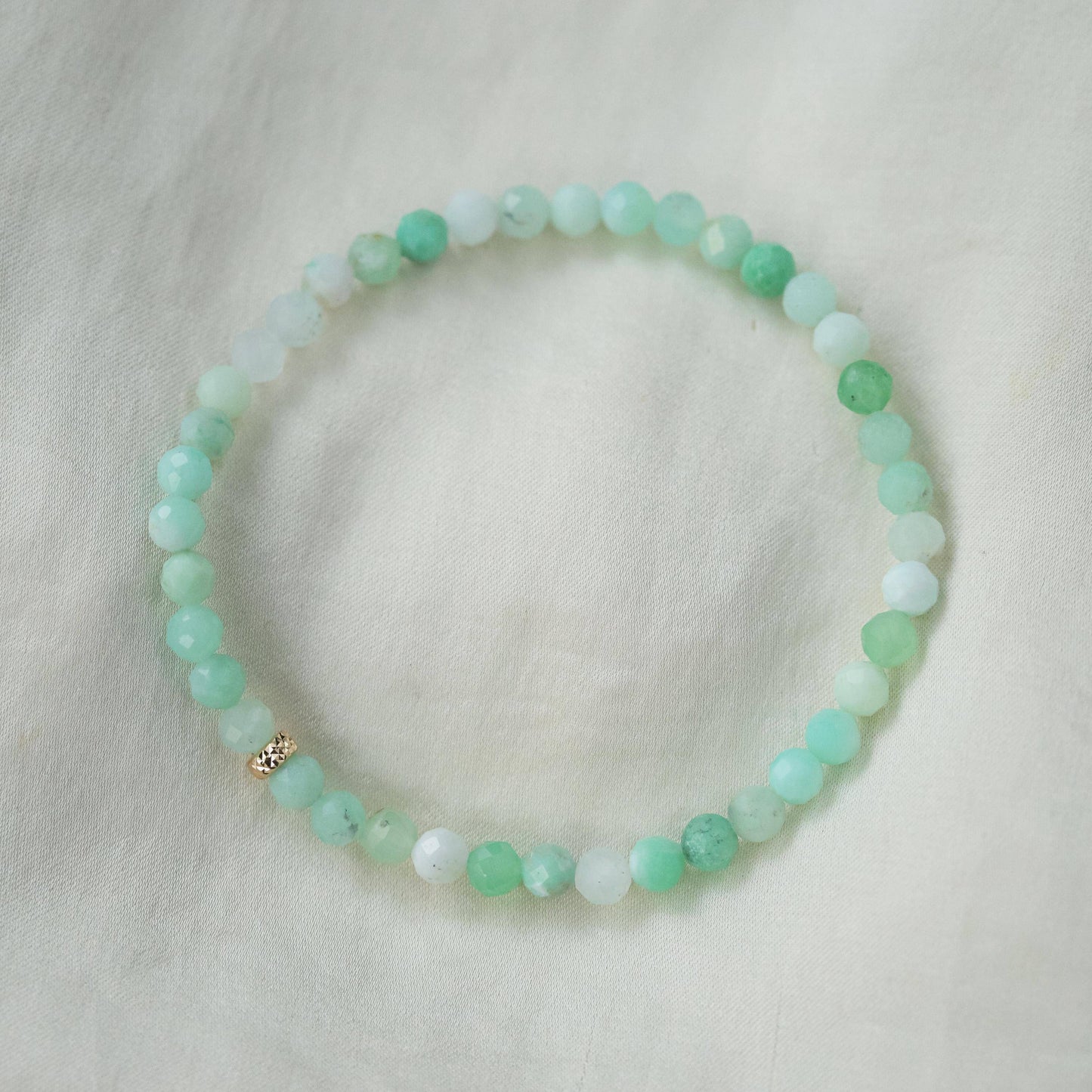Chrysoprase bracelet featuring polished green gemstone beads with a 14K gold clasp, handcrafted by Earthly Abundance.