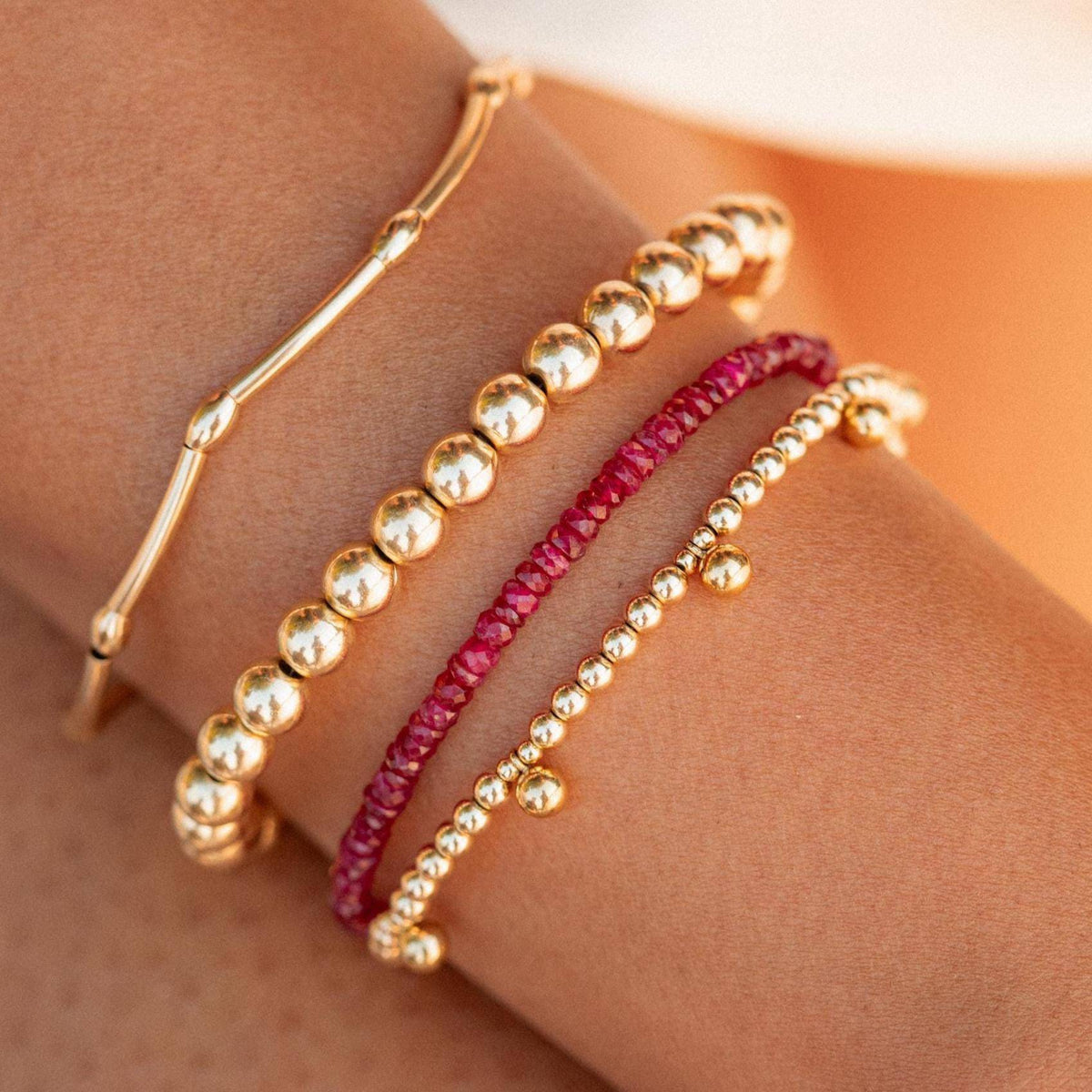 Carmine Longido Ruby bracelet from Earthly Abundance featuring vibrant red ruby beads on a delicate string.
