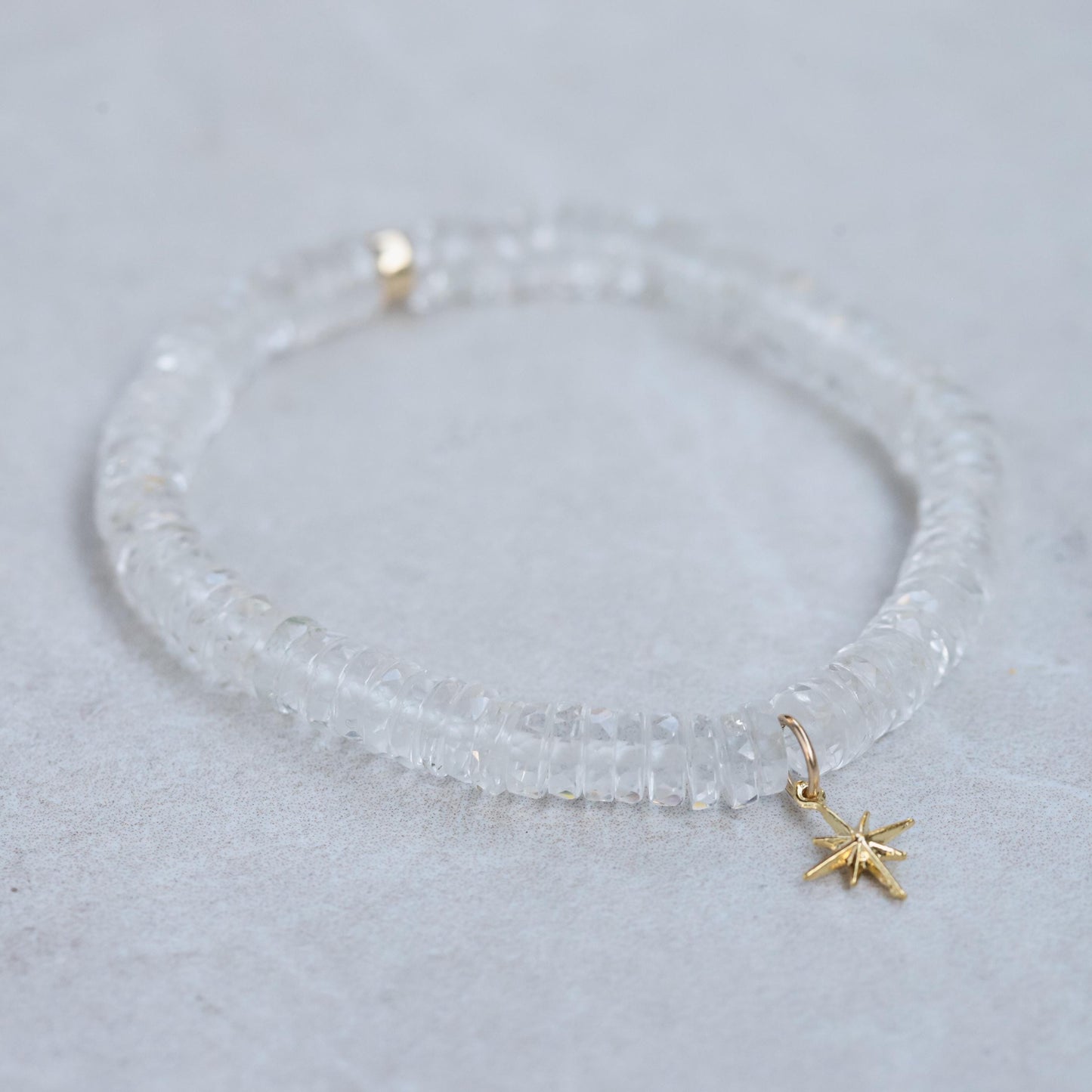 White Topaz Heishi bracelet with small round beads, featuring a simple and elegant design by Earthly Abundance.