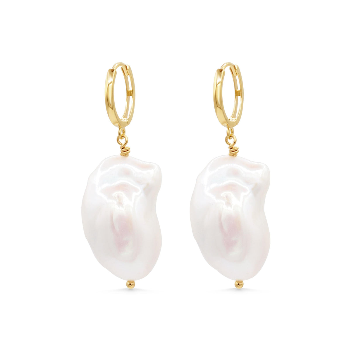 Baroque pearl earrings in 14K gold from Earthly Abundance, featuring irregularly shaped lustrous pearls on delicate gold hooks.