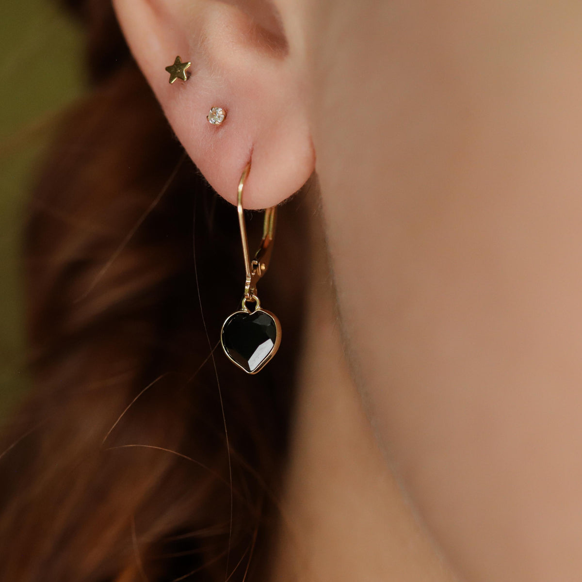 Black Spinel heart earrings in 14K gold with a romantic heart shape, crafted by Earthly Abundance.