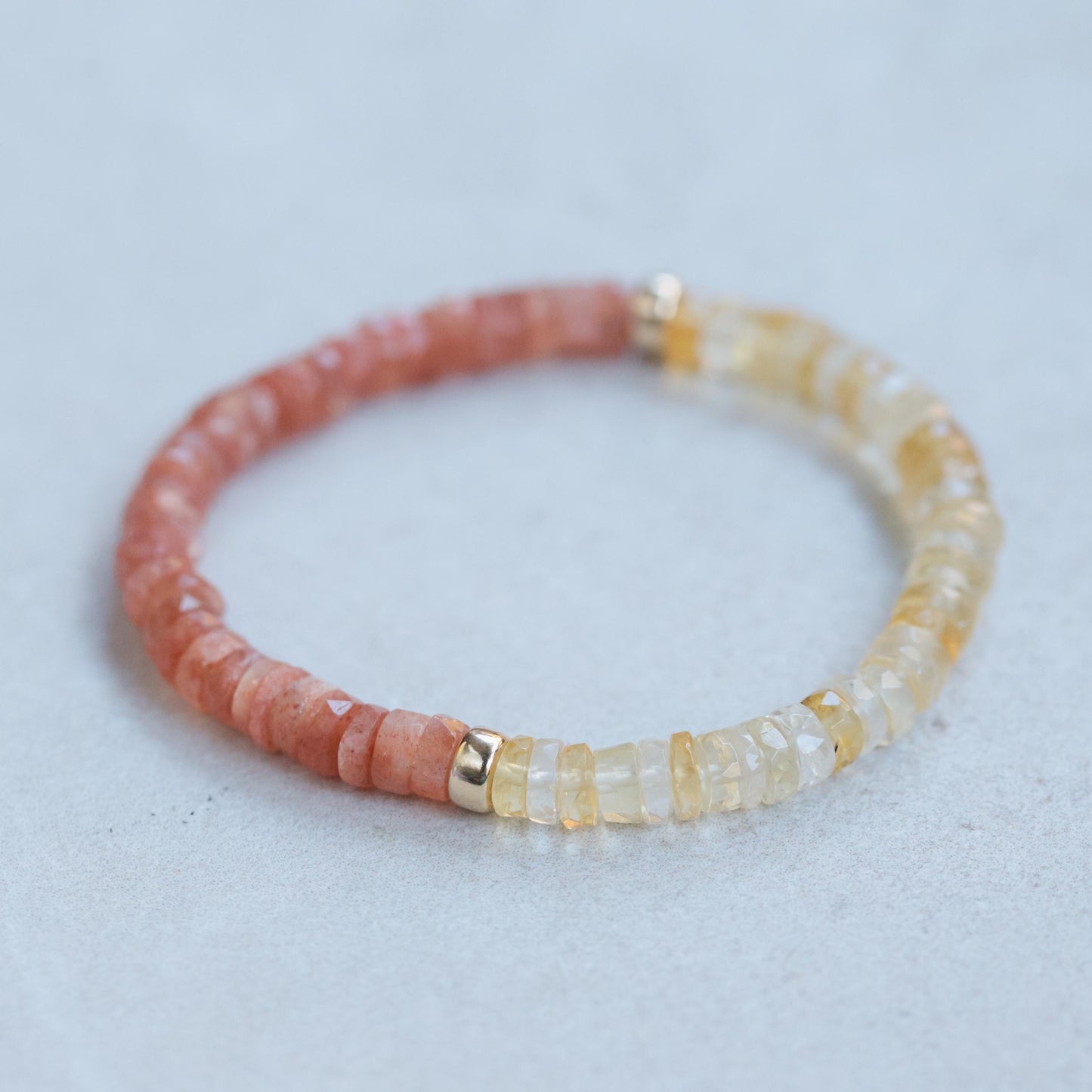 Golden Hour bracelet featuring sunstone and citrine beads from Earthly Abundance, showcasing warm, radiant gemstone accents.