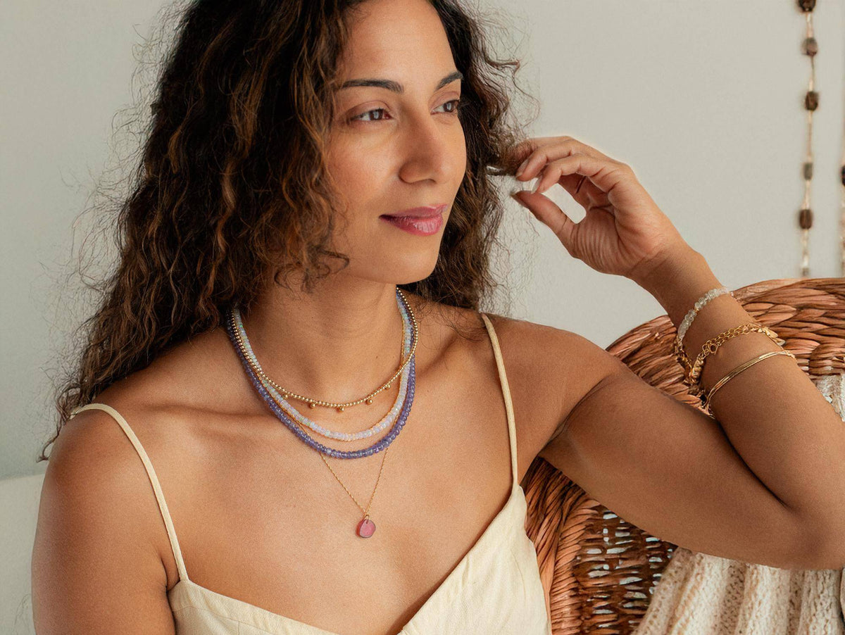Ethiopian Opal beaded necklace with multicolored gemstones and gold clasp, crafted by Earthly Abundance Jewelry.