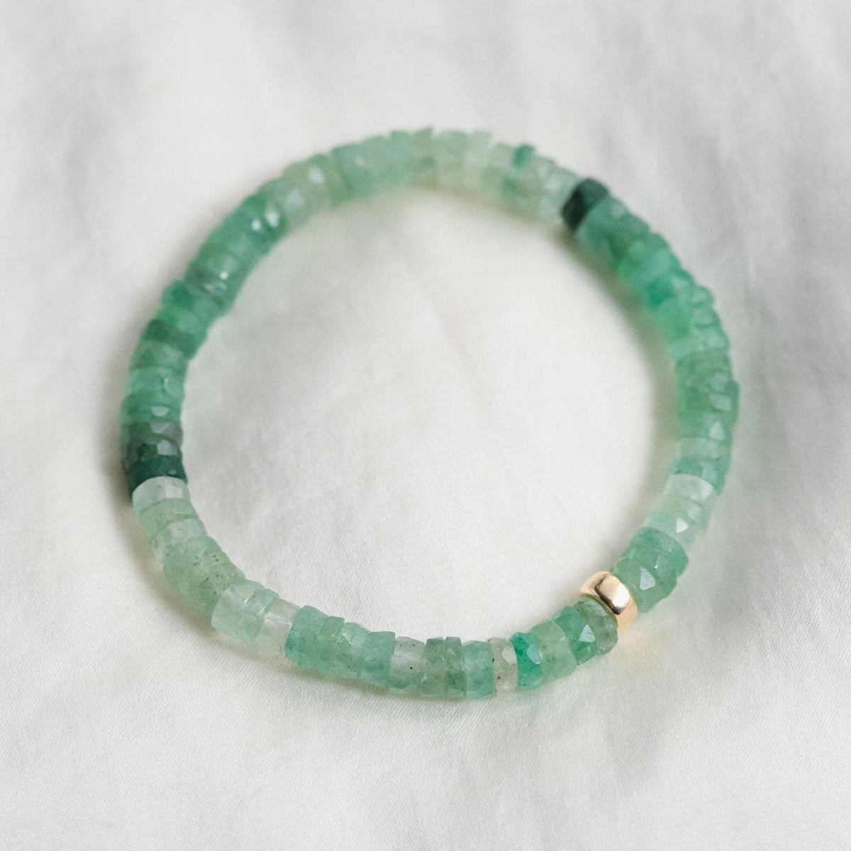 Green Strawberry Quartz Heishi bracelet featuring small, round gemstone beads from Earthly Abundance.
