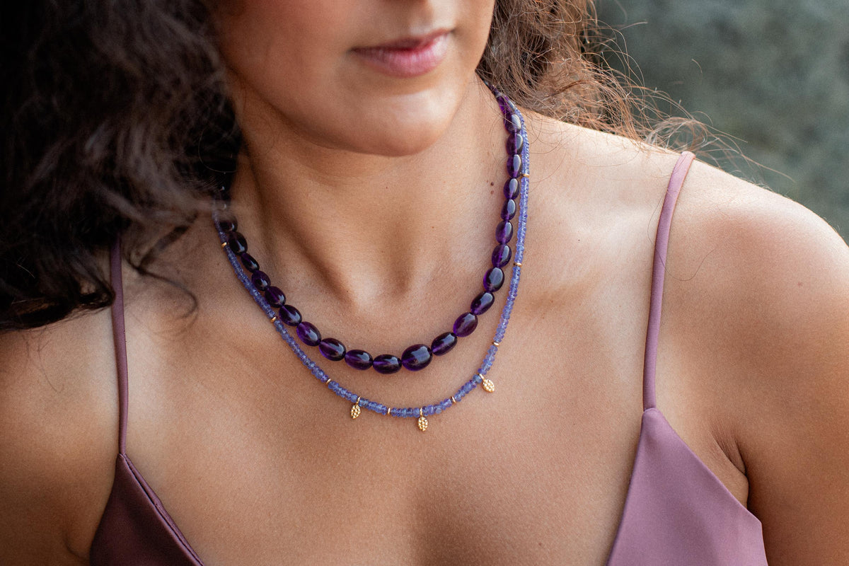 Earthly Abundance amethyst oval beaded necklace featuring polished purple gemstones on a delicate chain.