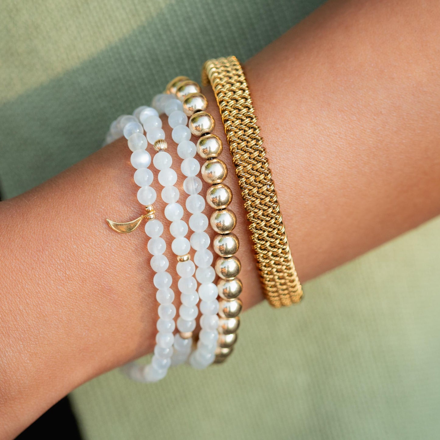 14K Moonstone bracelet from Earthly Abundance Jewelry featuring polished moonstone beads on a delicate gold chain.