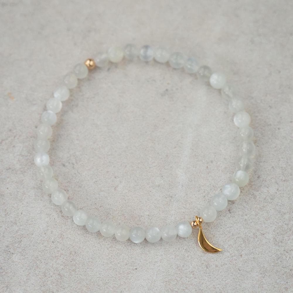 14K moonstone bracelet by Earthly Abundance Jewelry featuring smooth, luminous moonstone beads on a delicate chain.