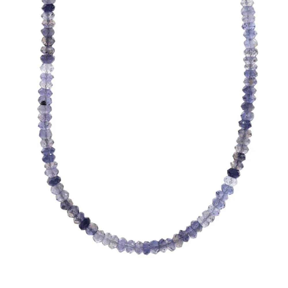 Iolite ombre necklace from Earthly Abundance Jewelry featuring a gradient of purple-blue stones on a silver chain.