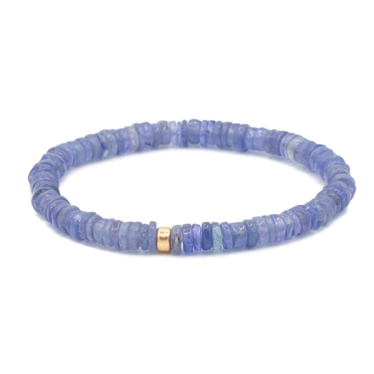 Earthly Abundance Tanzanite stretch bracelet featuring vibrant blue-purple tanzanite gemstones on an elastic band.