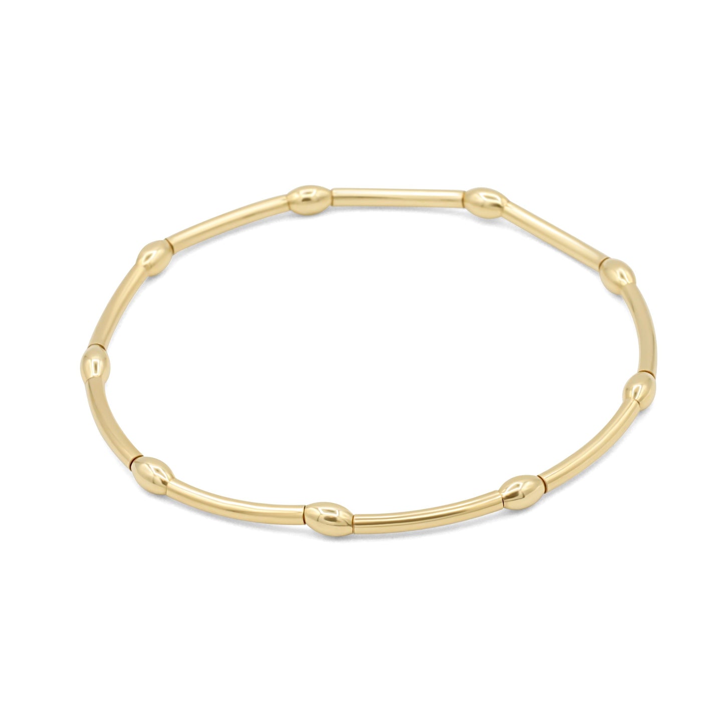 14K gold filled curve bracelet by Earthly Abundance featuring a sleek, curved design and shiny gold finish.