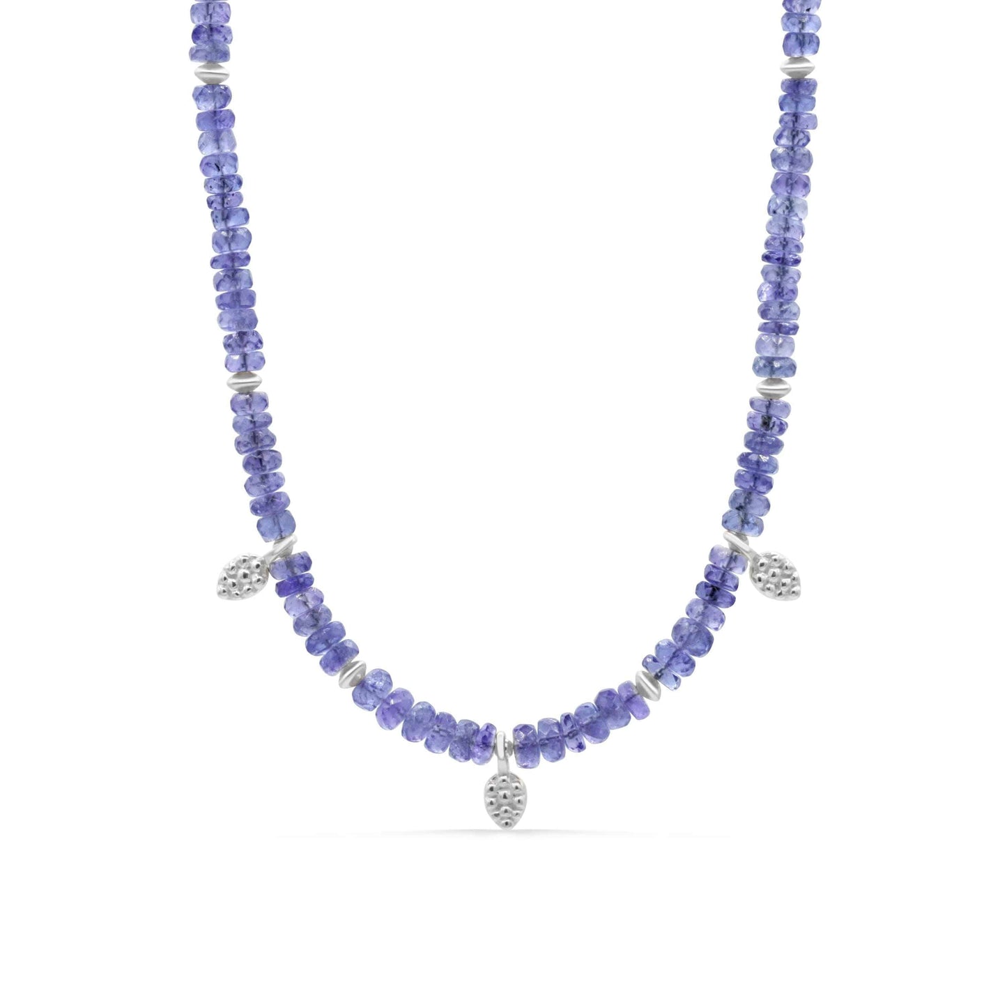 Elegant Tanzanite necklace featuring a deep blue-purple gemstone pendant on a silver chain, by Earthly Abundance.
