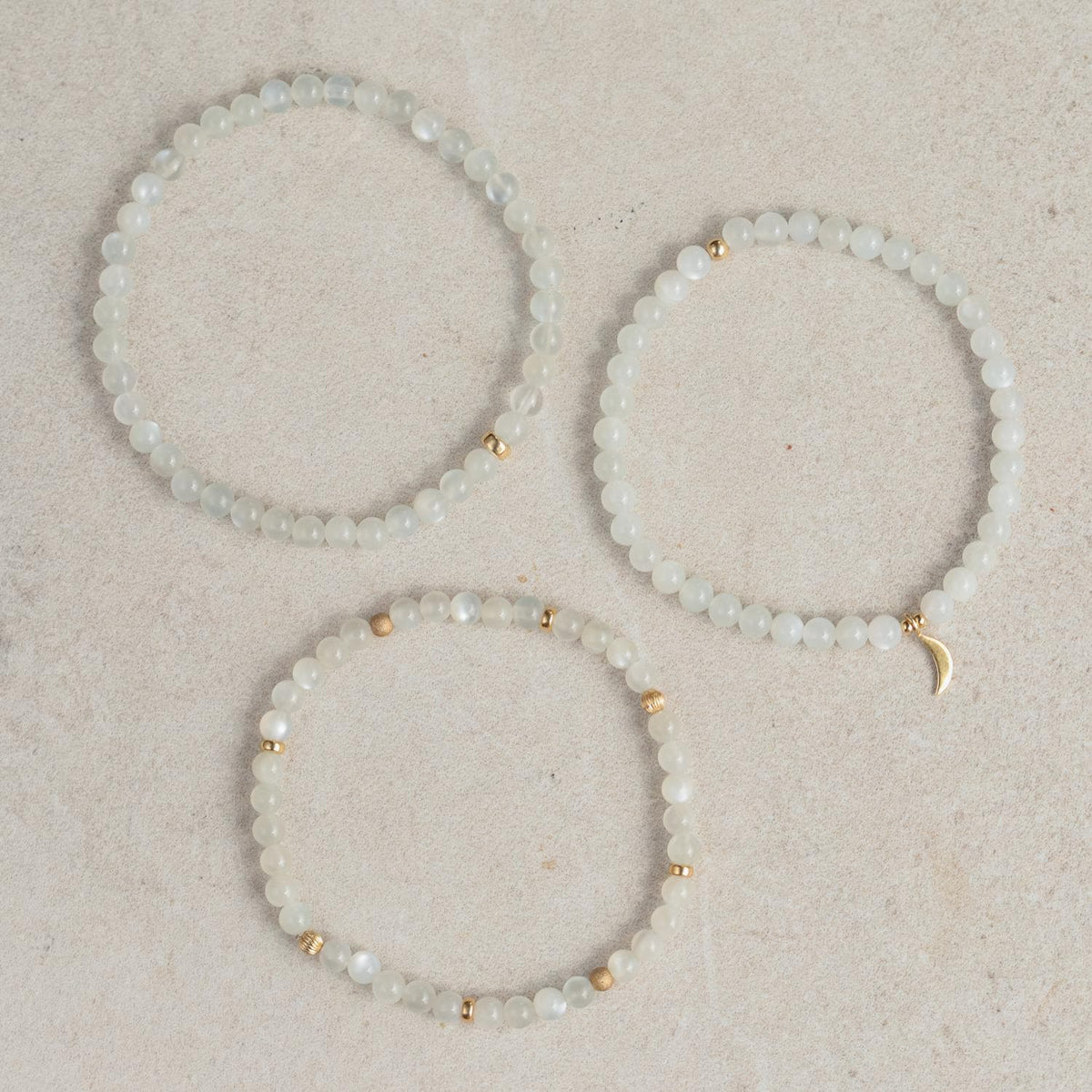14K moonstone bracelet by Earthly Abundance Jewelry featuring smooth moonstone beads on a delicate metal chain.