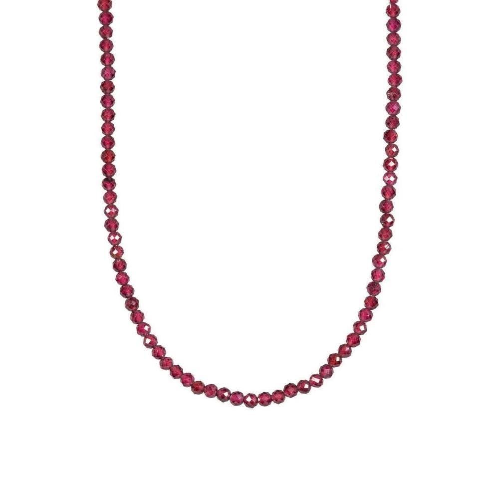 Garnet beaded necklace by Earthly Abundance Jewelry featuring polished red garnet beads on a delicate string.