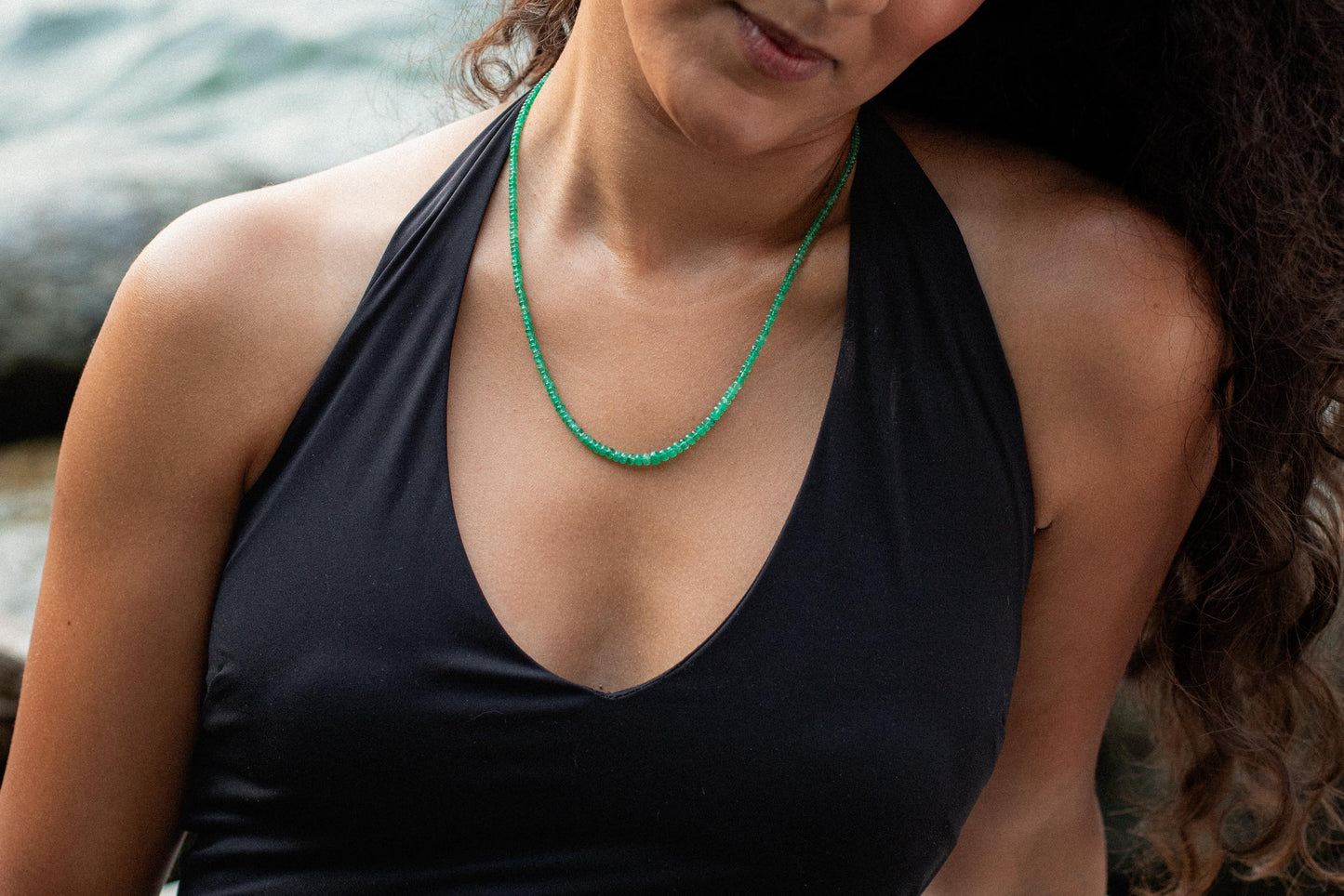 Zambian emerald smooth rondel necklace featuring vibrant green emerald beads on a delicate chain, by Earthly Abundance.