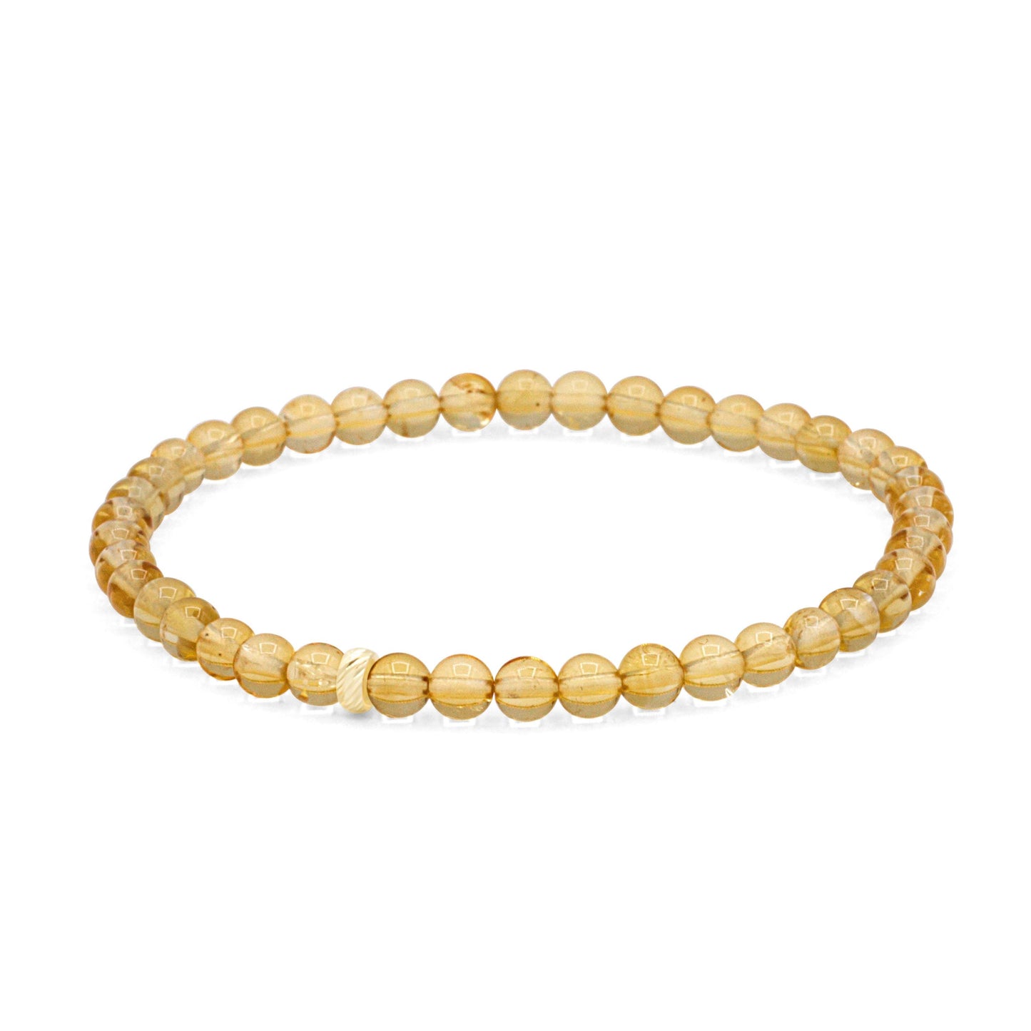 Earthly Abundance Solar Citrine bracelet with 14K gold accents, featuring polished orange-yellow citrine stones on a delicate bracelet.