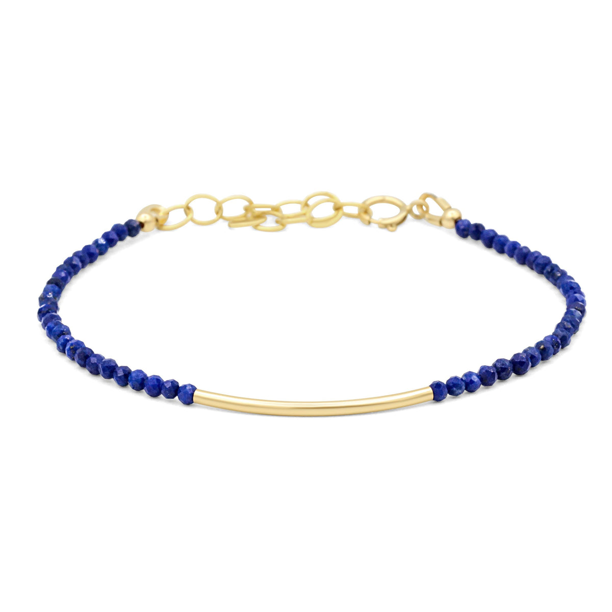 Ultra slim Lapis Lazuli bracelet featuring deep blue stones with golden pyrite accents, designed by Earthly Abundance.