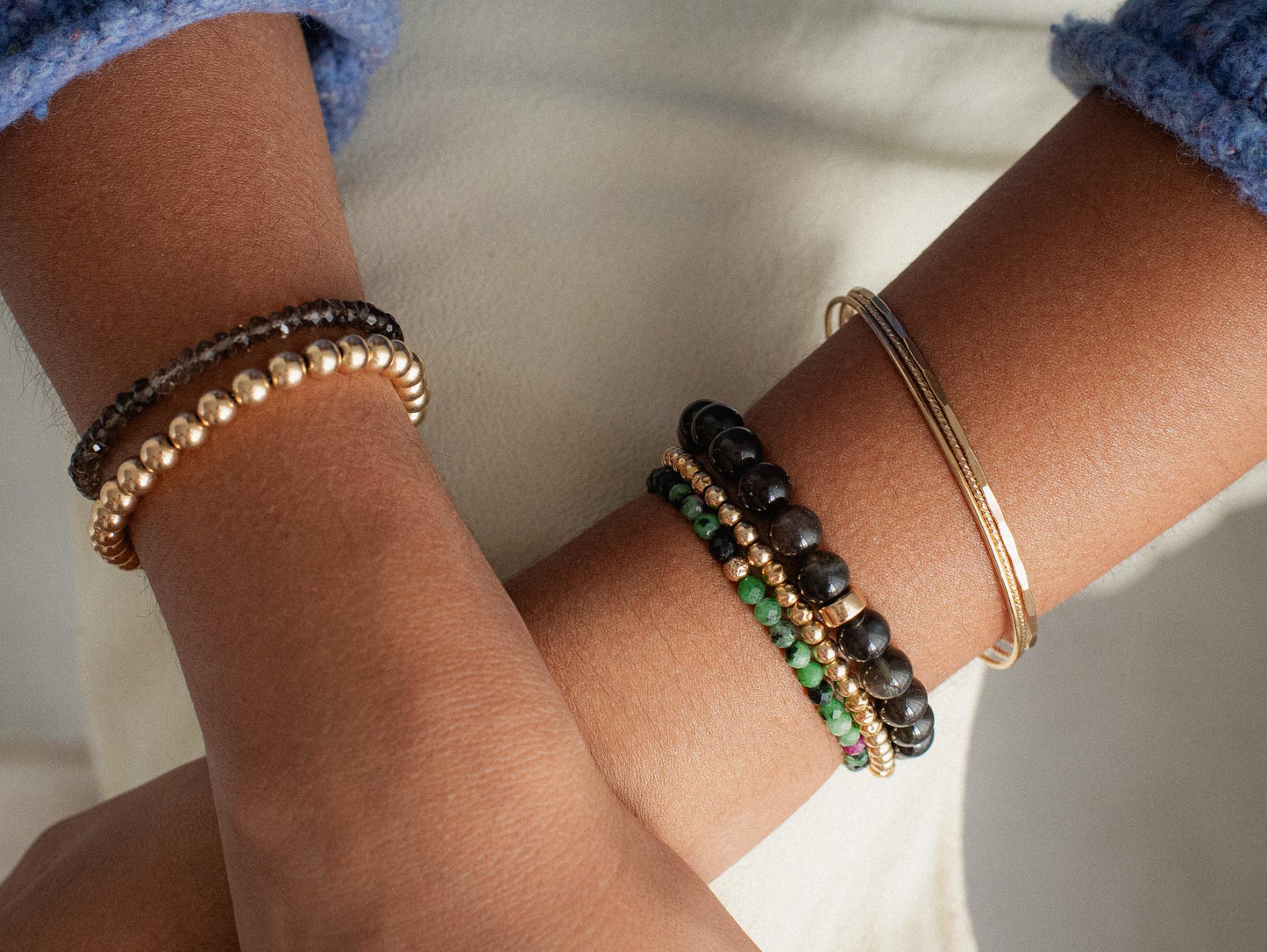 14K scapolite bracelet by Earthly Abundance featuring polished scapolite stones on a delicate metal chain.