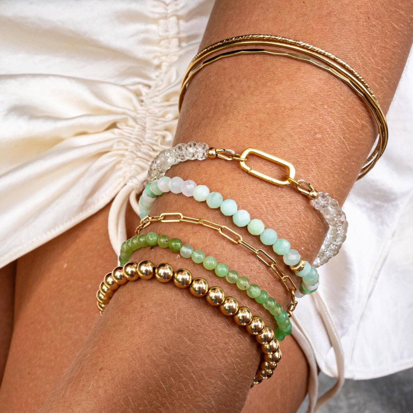 Green Amethyst bracelet by Earthly Abundance featuring polished gemstone beads on an elastic band.
