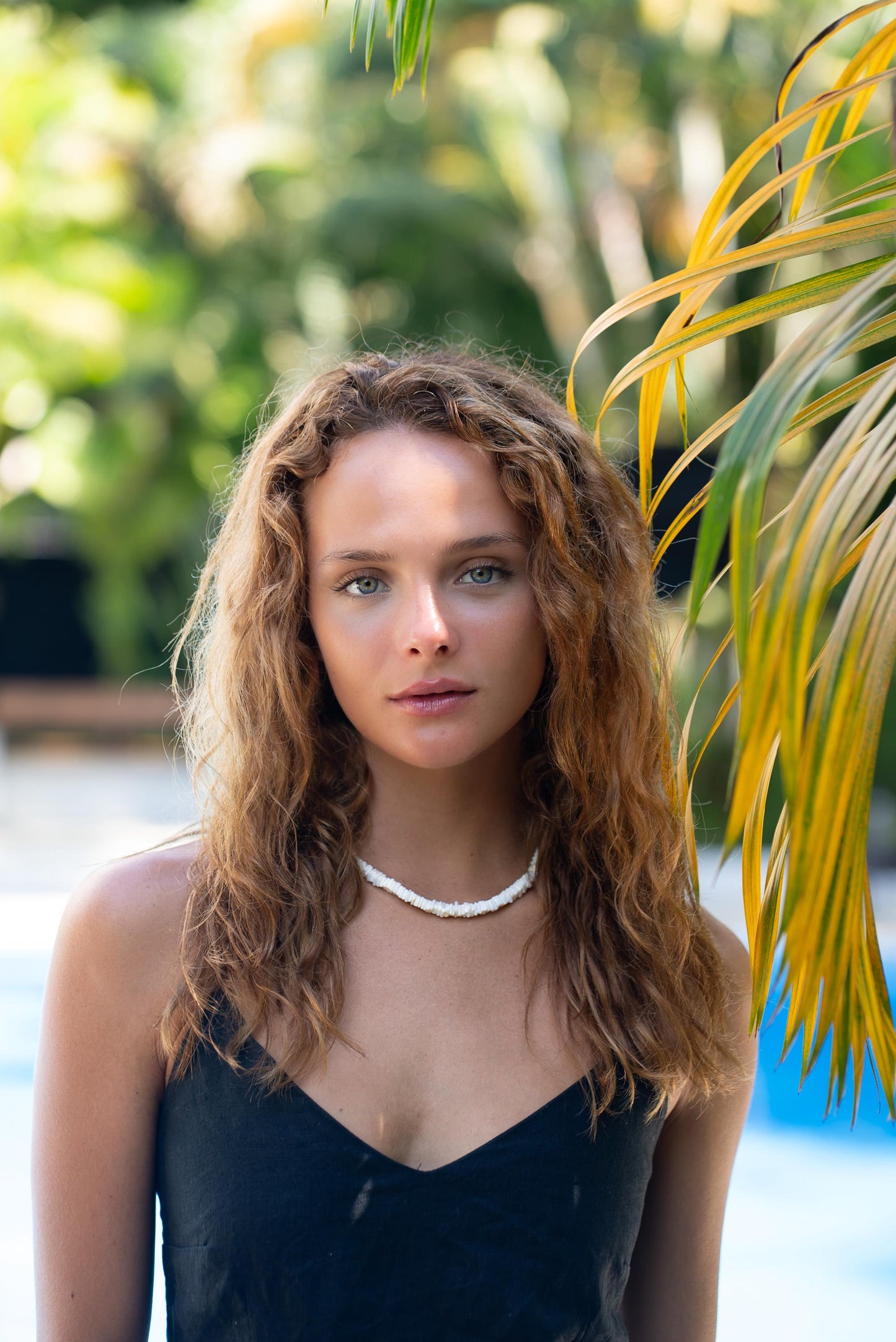 White opal necklace with coastal-inspired design from Earthly Abundance featuring a delicate pendant on a silver chain.