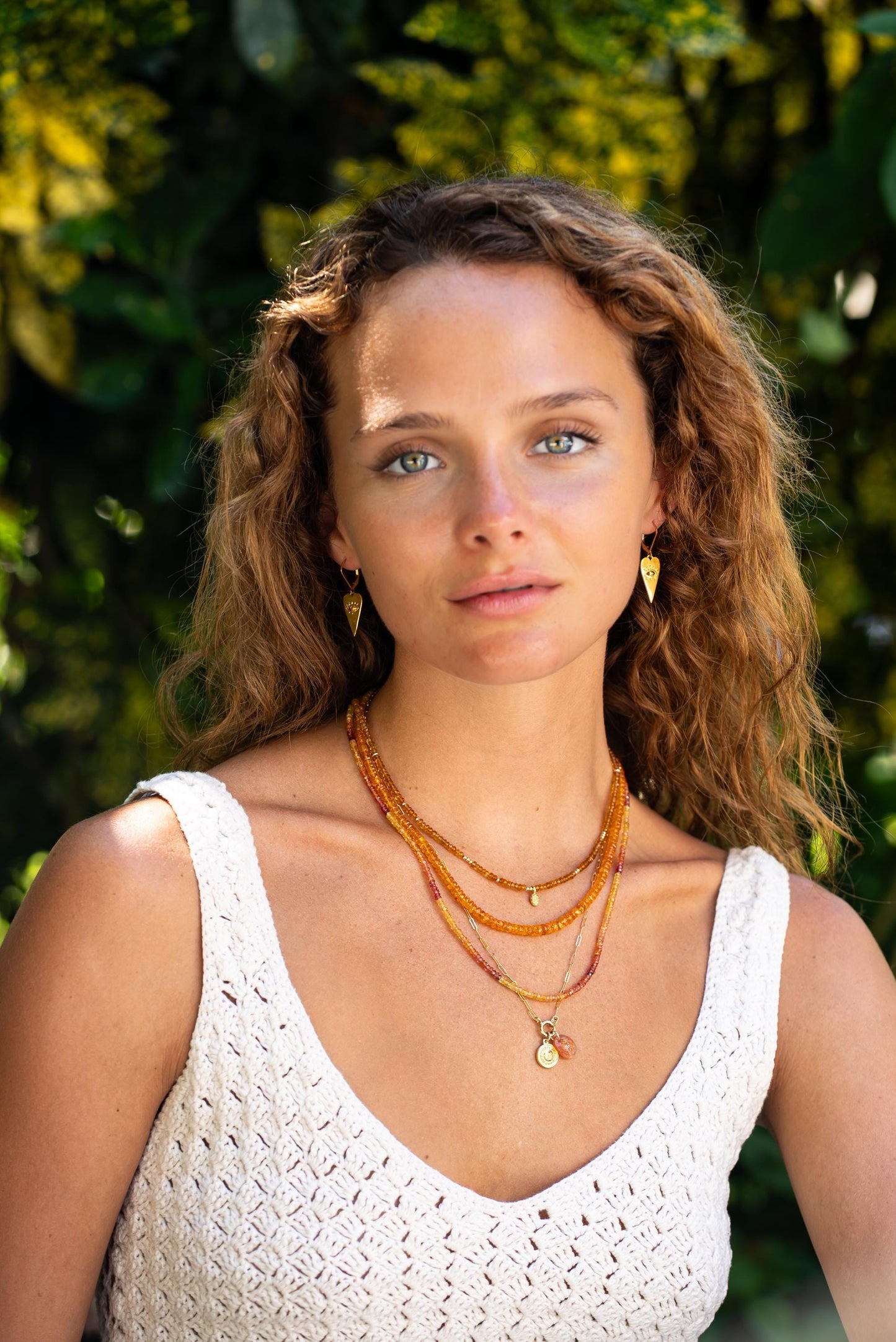 Pink and yellow Songea sapphire necklace from Earthly Abundance with vibrant gemstones on a delicate chain.