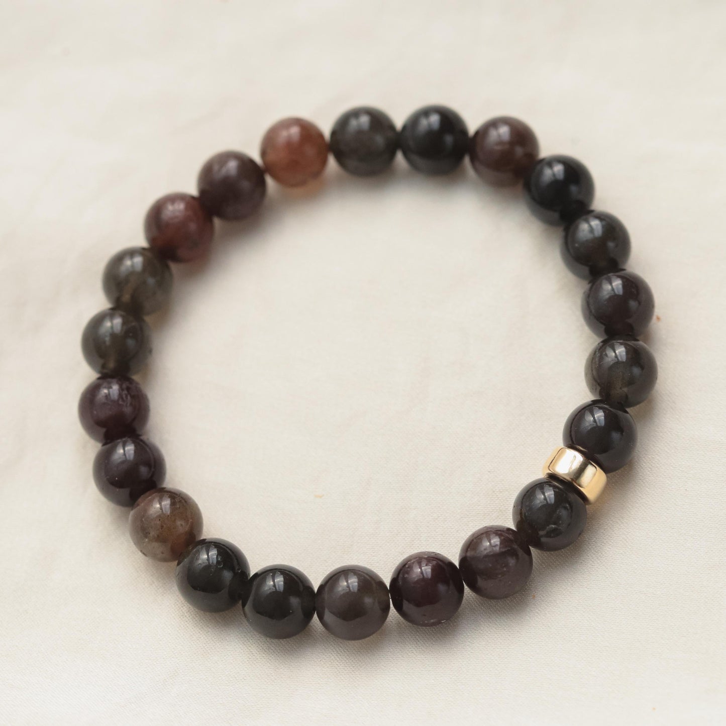 14K scapolite bracelet by Earthly Abundance featuring colorful gemstone beads and a delicate clasp design.