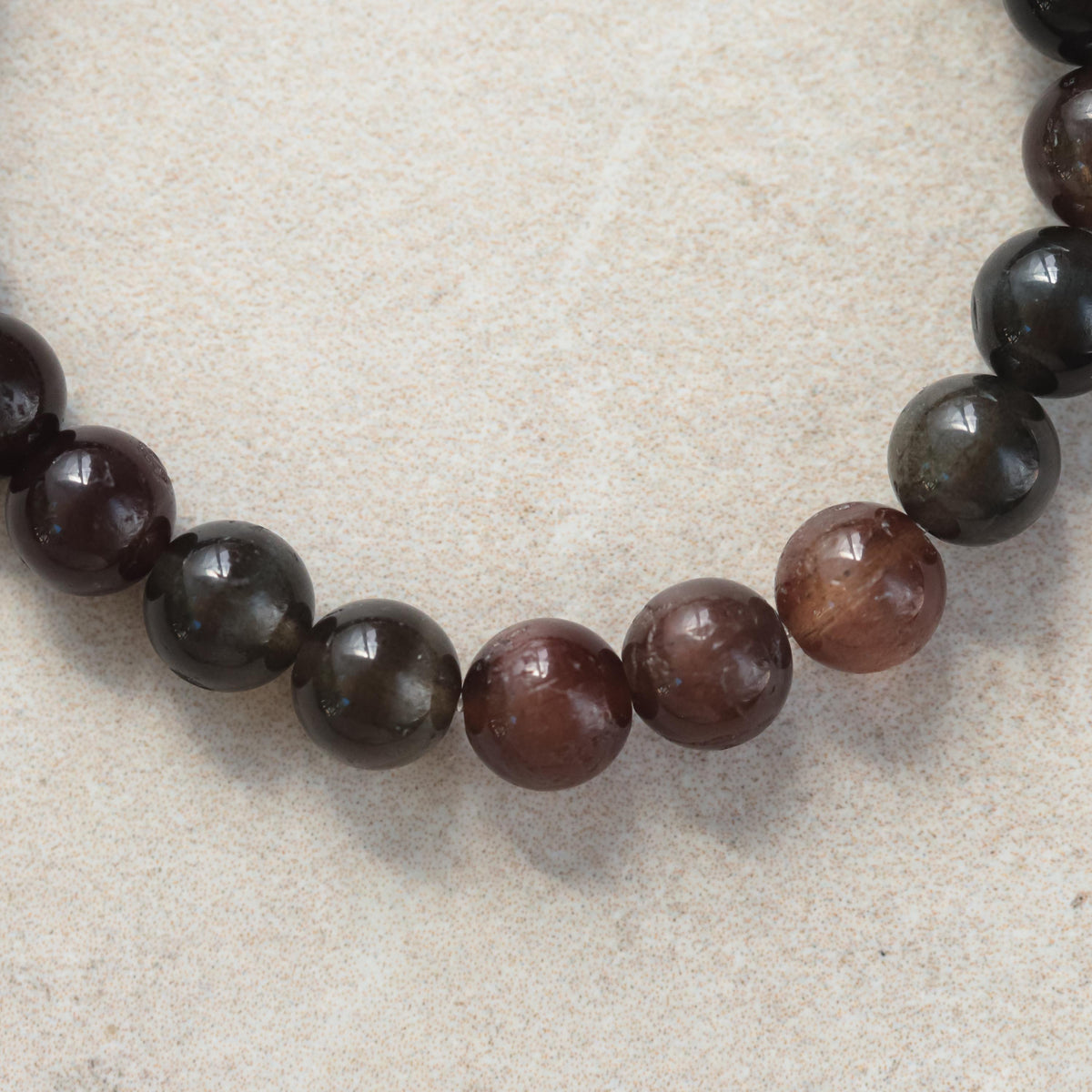 14K scapolite bracelet by Earthly Abundance featuring polished scapolite stones on a delicate gold chain.