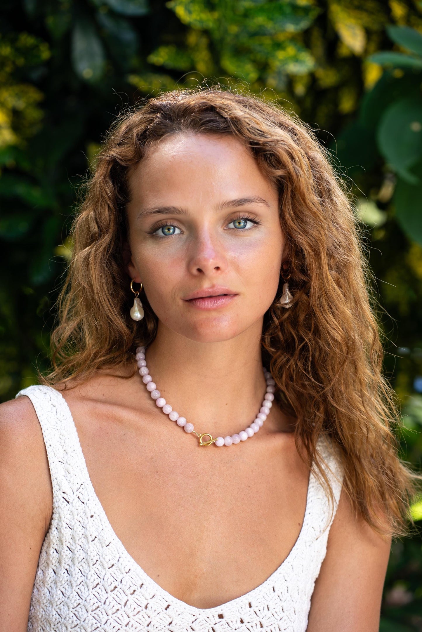 Kunzite beaded toggle necklace from Earthly Abundance featuring pink-purple stones on a silver toggle clasp.
