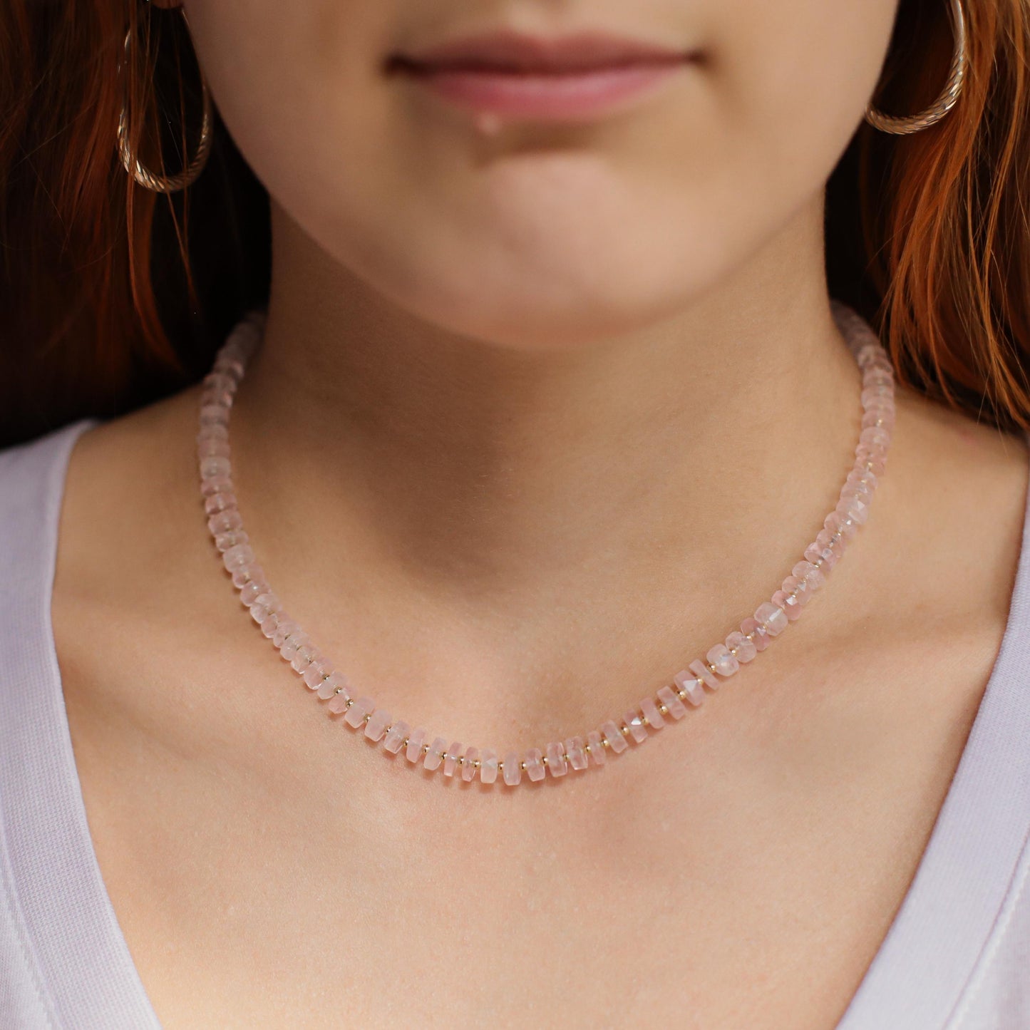 Soft Love Rose Quartz Necklace by Earthly Abundance featuring a delicate pink rose quartz pendant on a silver chain.