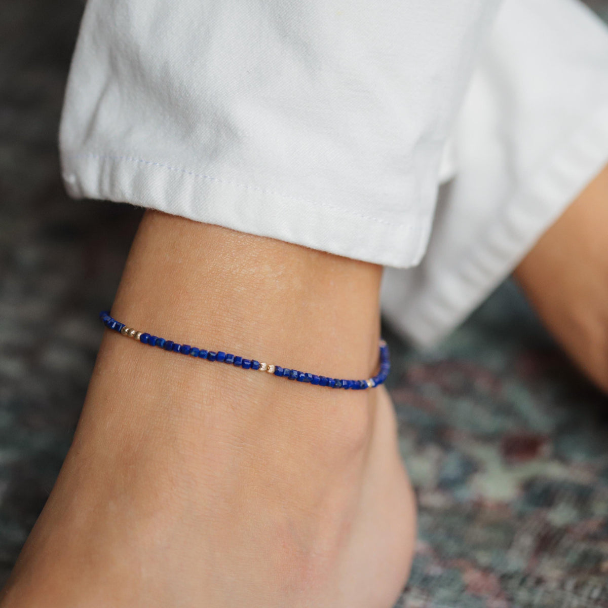 Lapis Lazuli cube anklet with silver chain from Earthly Abundance featuring blue gemstone beads and adjustable clasp.