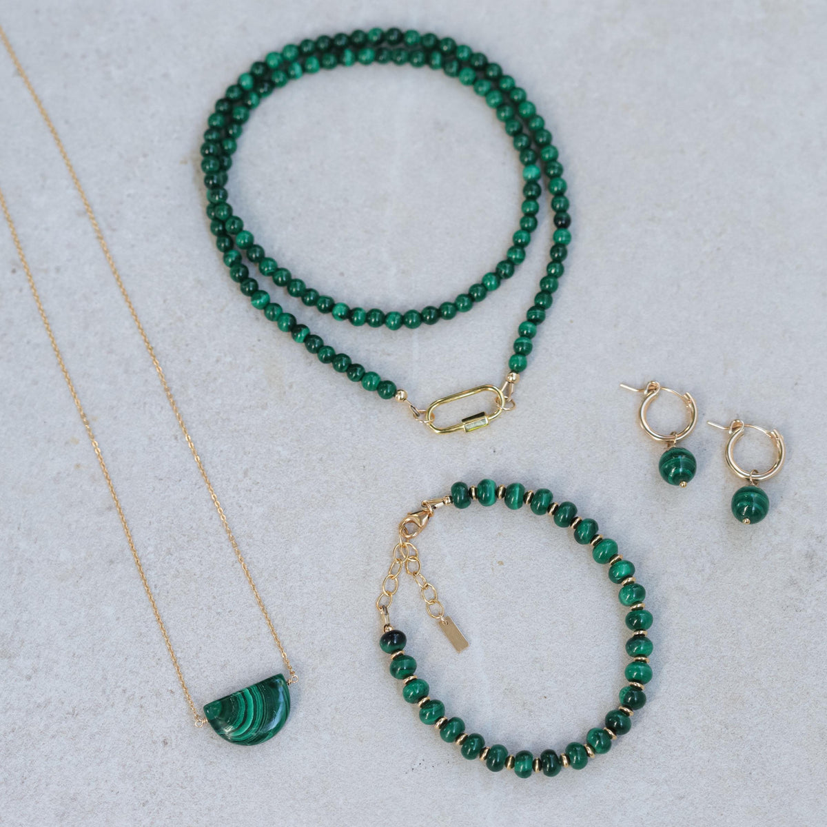 Malachite carabiner clasp from Earthly Abundance Jewelry, 4mm size with vibrant green and black natural stone pattern.