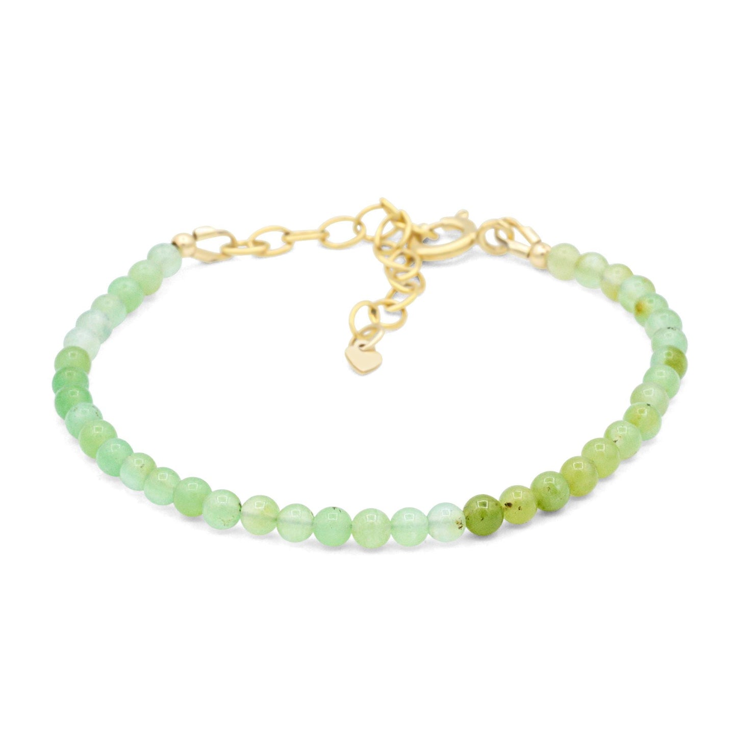 Soft green Australian Chrysoprase bracelet with polished oval beads, strung on an elastic band, displayed on a neutral background.