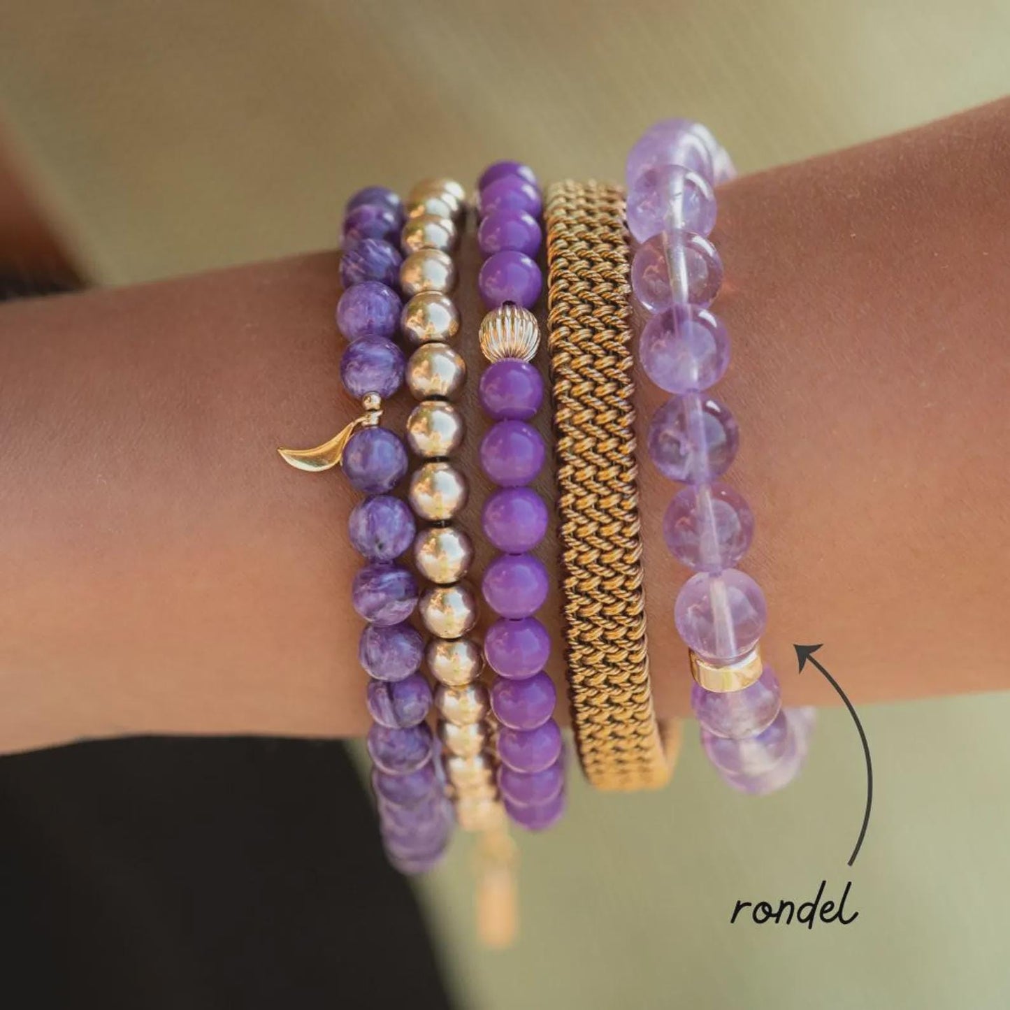 Lavender Amethyst bracelet with 14K gold setting from Earthly Abundance, featuring polished purple amethyst stones on a delicate gold chain.