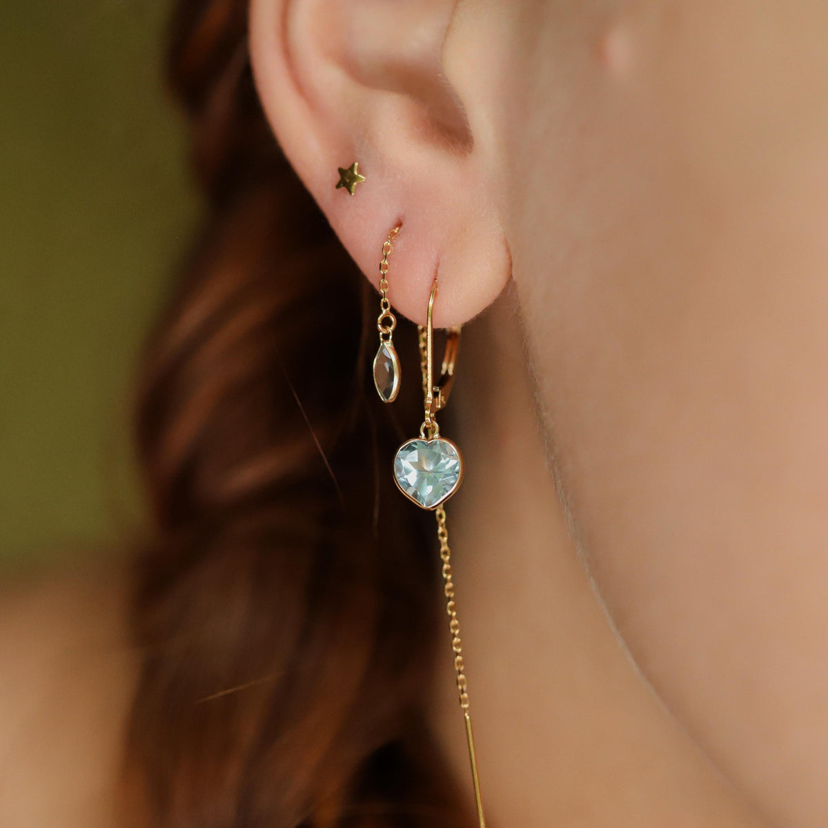 Blue Topaz marquise threader earrings in 14K gold with delicate design, featuring sparkling blue topaz gemstones.