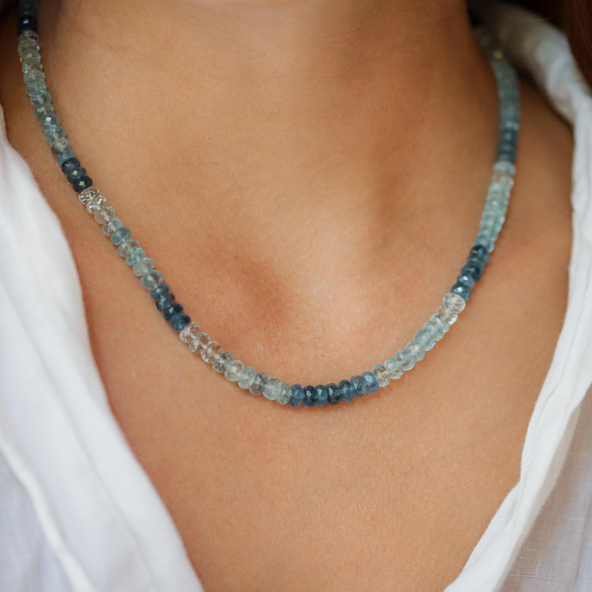 Santa Maria aquamarine necklace with a silver chain featuring a large, oval aquamarine pendant and intricate silver detailing.