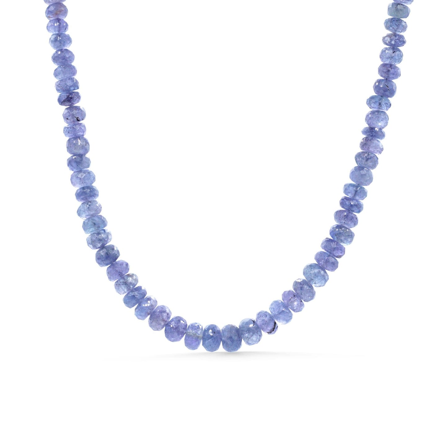Indigo Muse Tanzanite necklace with deep blue gemstones and silver chain from Earthly Abundance Jewelry.