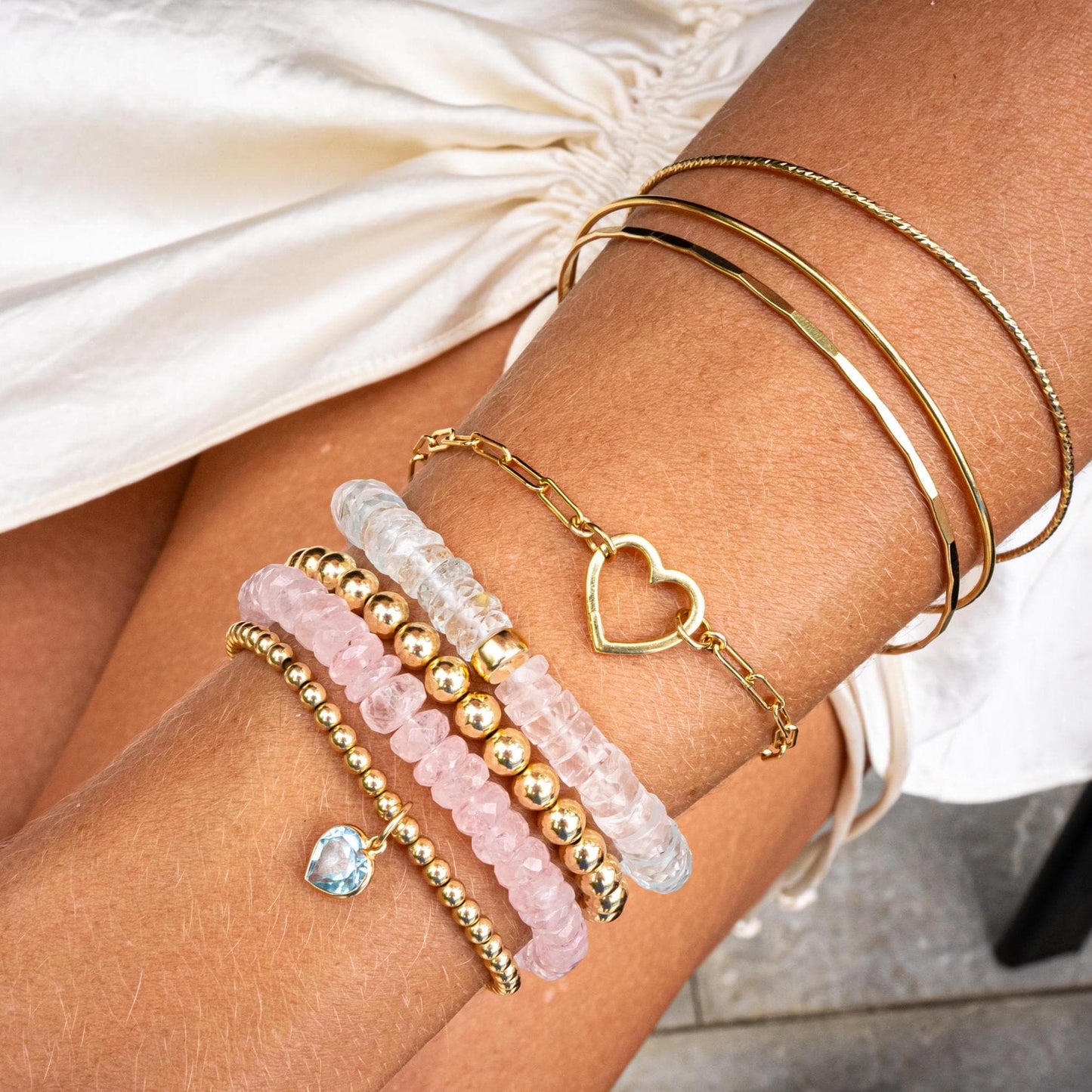 Elegant sweetheart bracelet by Earthly Abundance featuring Morganite, Aquamarine, and White Topaz gemstones.