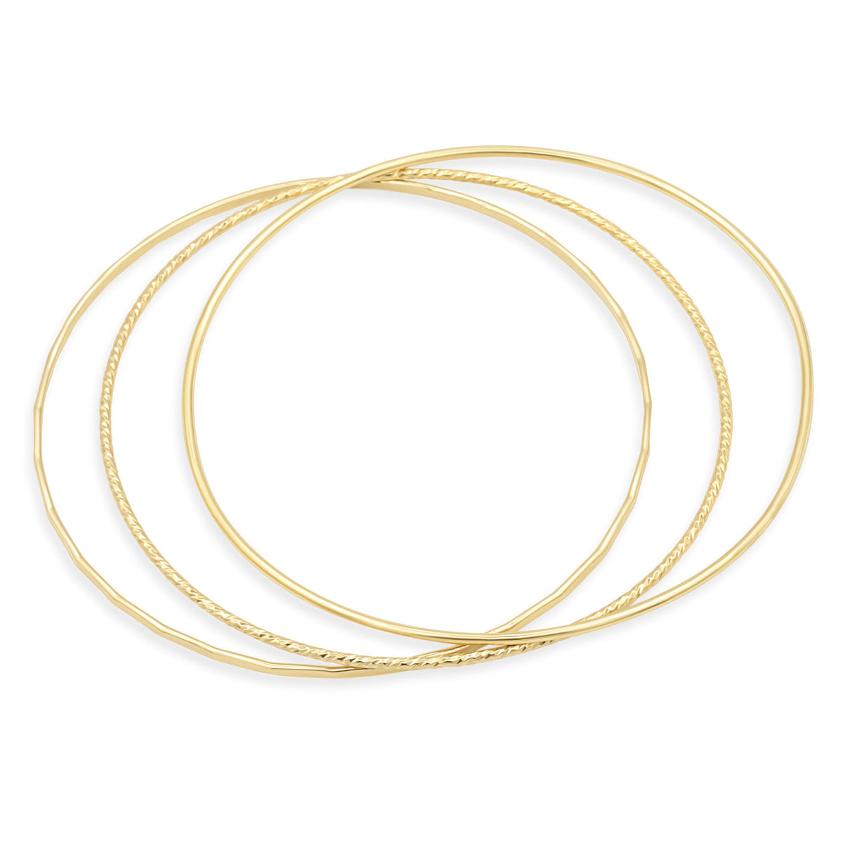 Set of gold-filled bangles featuring smooth, hammered, and sparkly finishes, showcasing elegant jewelry by Earthly Abundance.