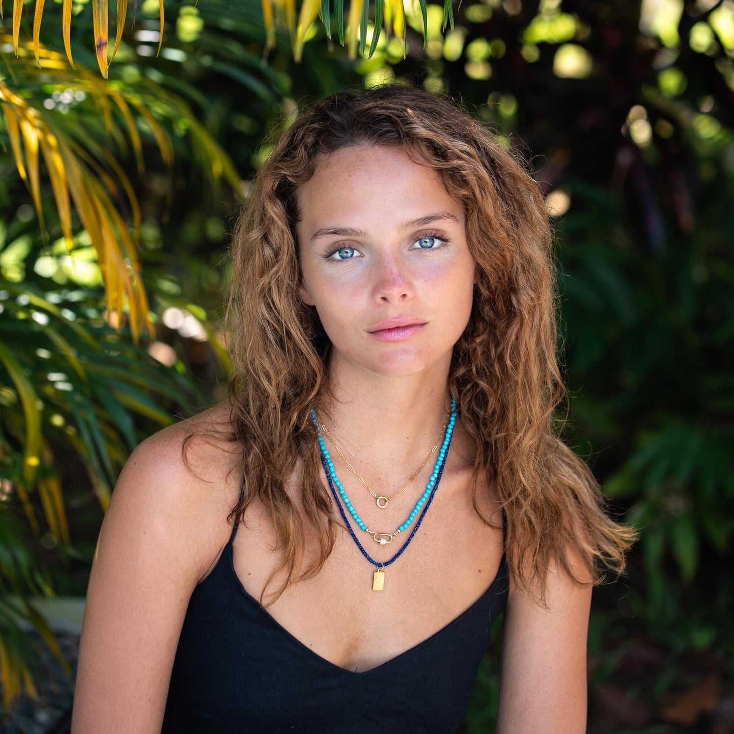 14K gold-filled Golden Link Necklace from Earthly Abundance featuring interlocking chain links on a neutral background.