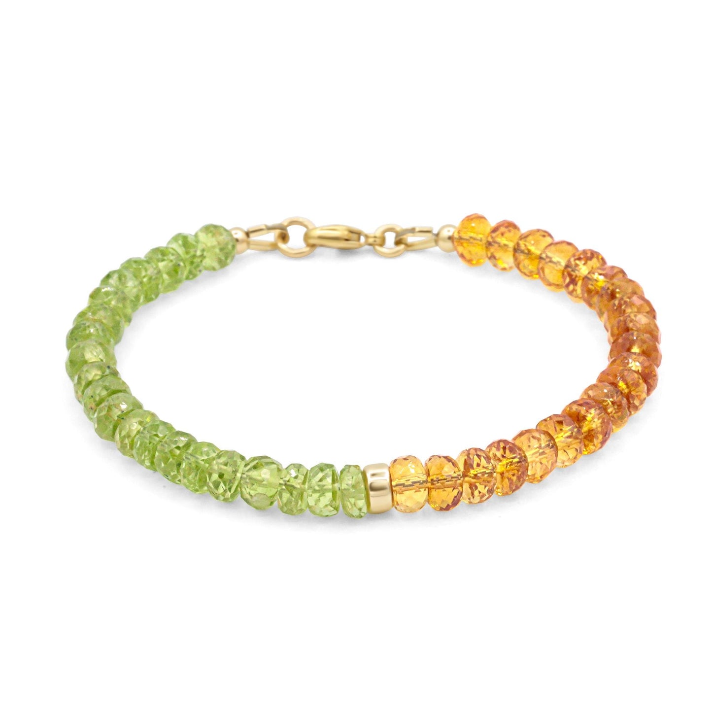 Peridot and citrine bracelet featuring vibrant green and yellow gemstones on a delicate gold chain.