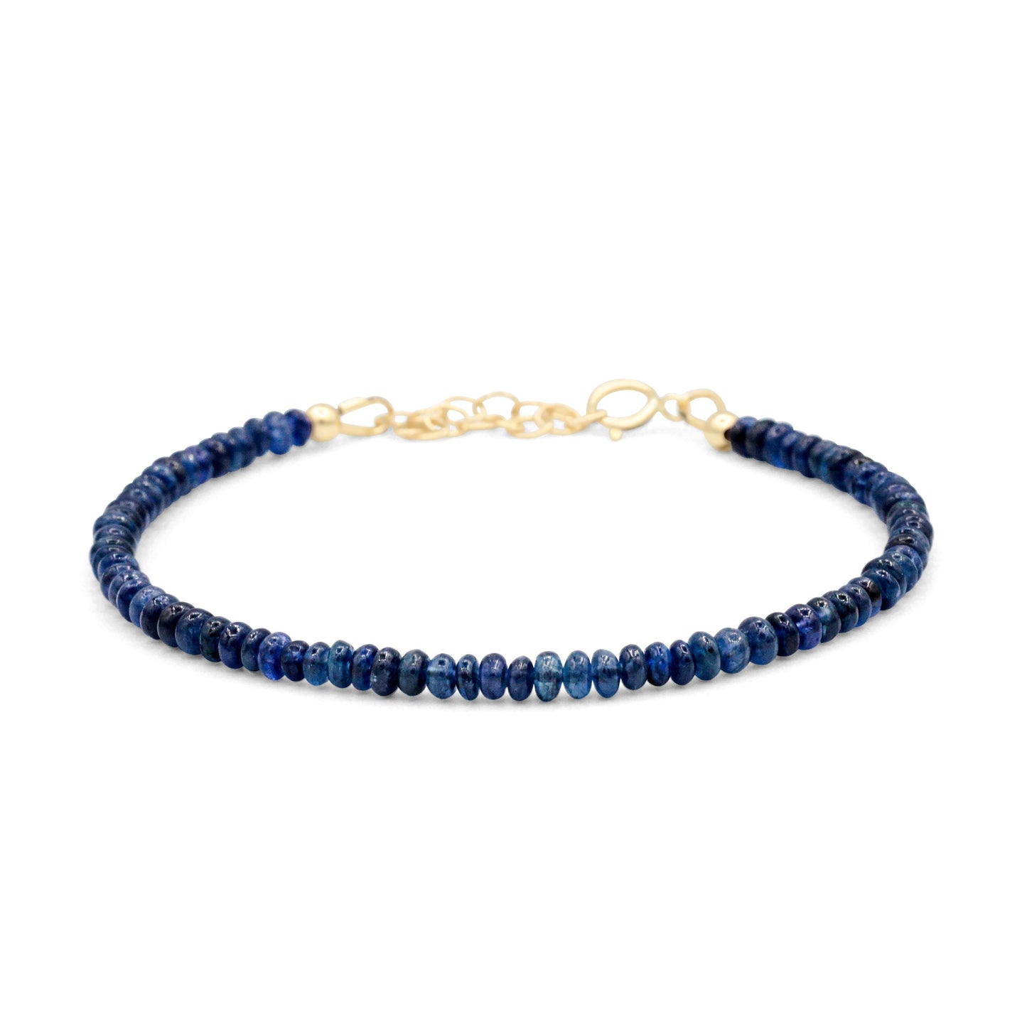 Blue Sapphire rondel bracelet featuring polished blue sapphire beads on a delicate string, by Earthly Abundance.