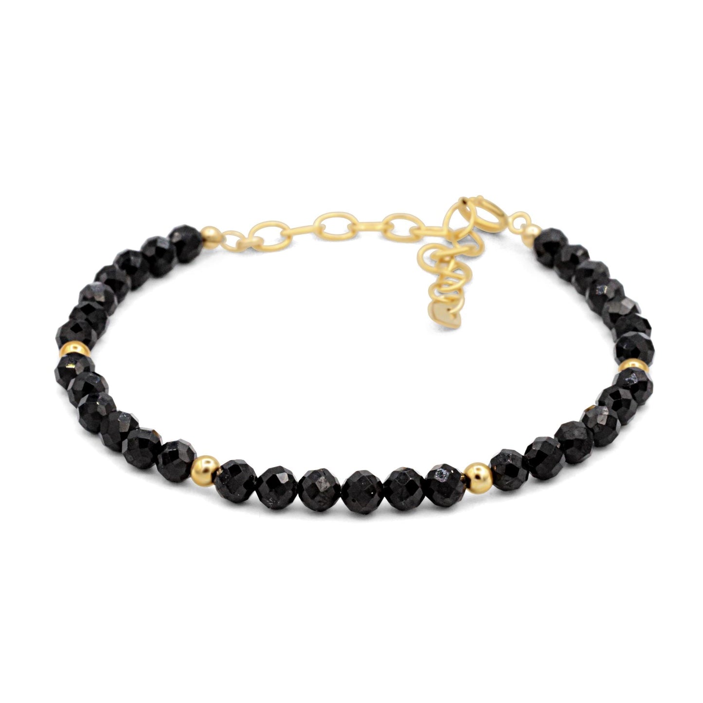 Black spinel bracelet with 14K gold-filled accents from Earthly Abundance, showcasing the elegant gemstone beads and gold details.