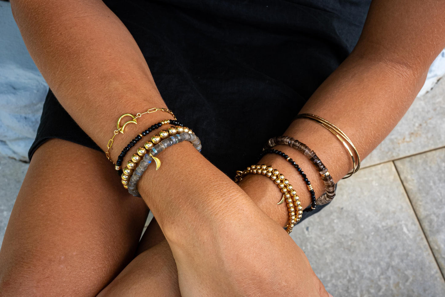 Grounding Smoky Quartz Heishi Bracelet by Earthly Abundance featuring smooth, round smoky quartz beads on a stretch cord.