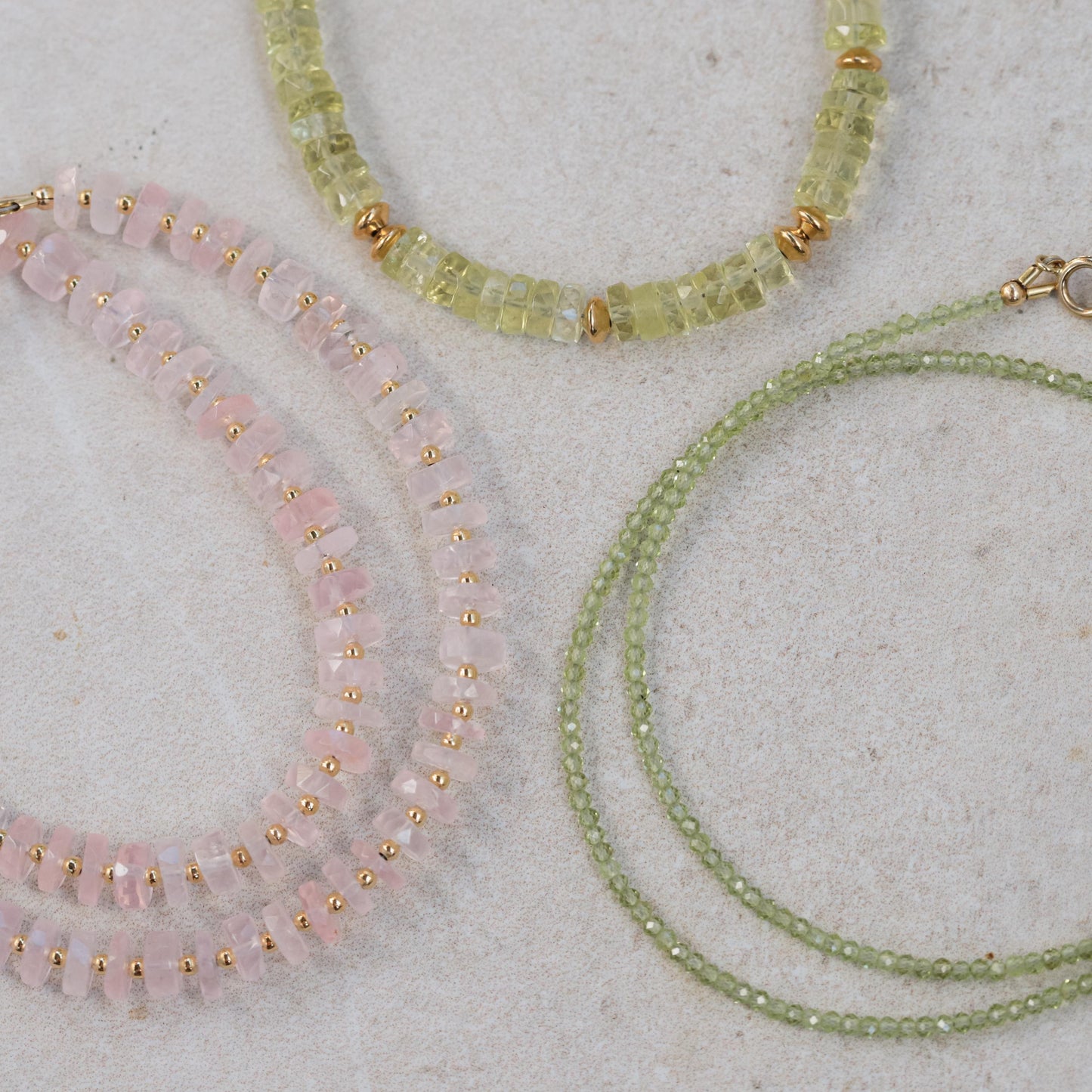 Soft Love Rose Quartz necklace by Earthly Abundance featuring a polished pink rose quartz pendant on a delicate chain.