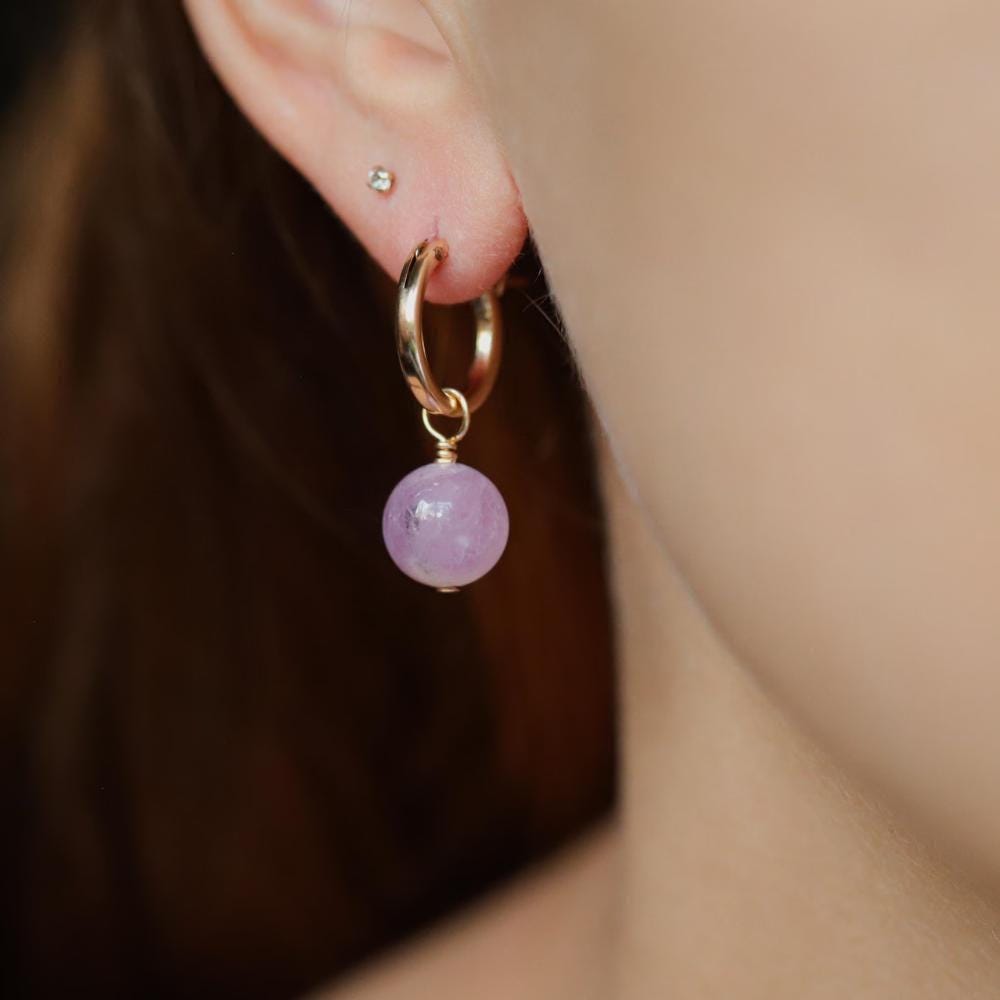 Kunzite hoop earrings with 14K gold filled setting, featuring pink kunzite stones and gold hoops, elegant jewelry accessory.