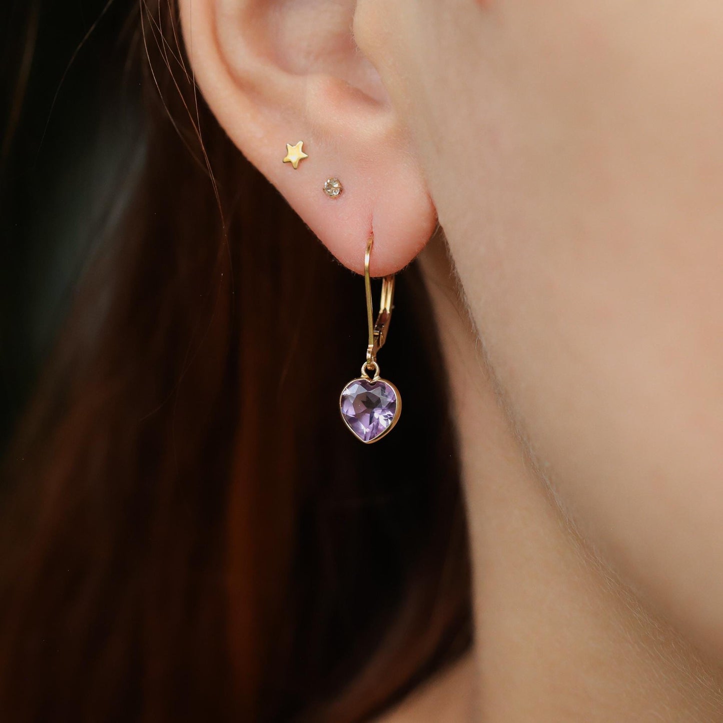 African Amethyst Heart Earrings in 14K gold, featuring polished amethyst hearts and gold hooks for elegant jewelry.