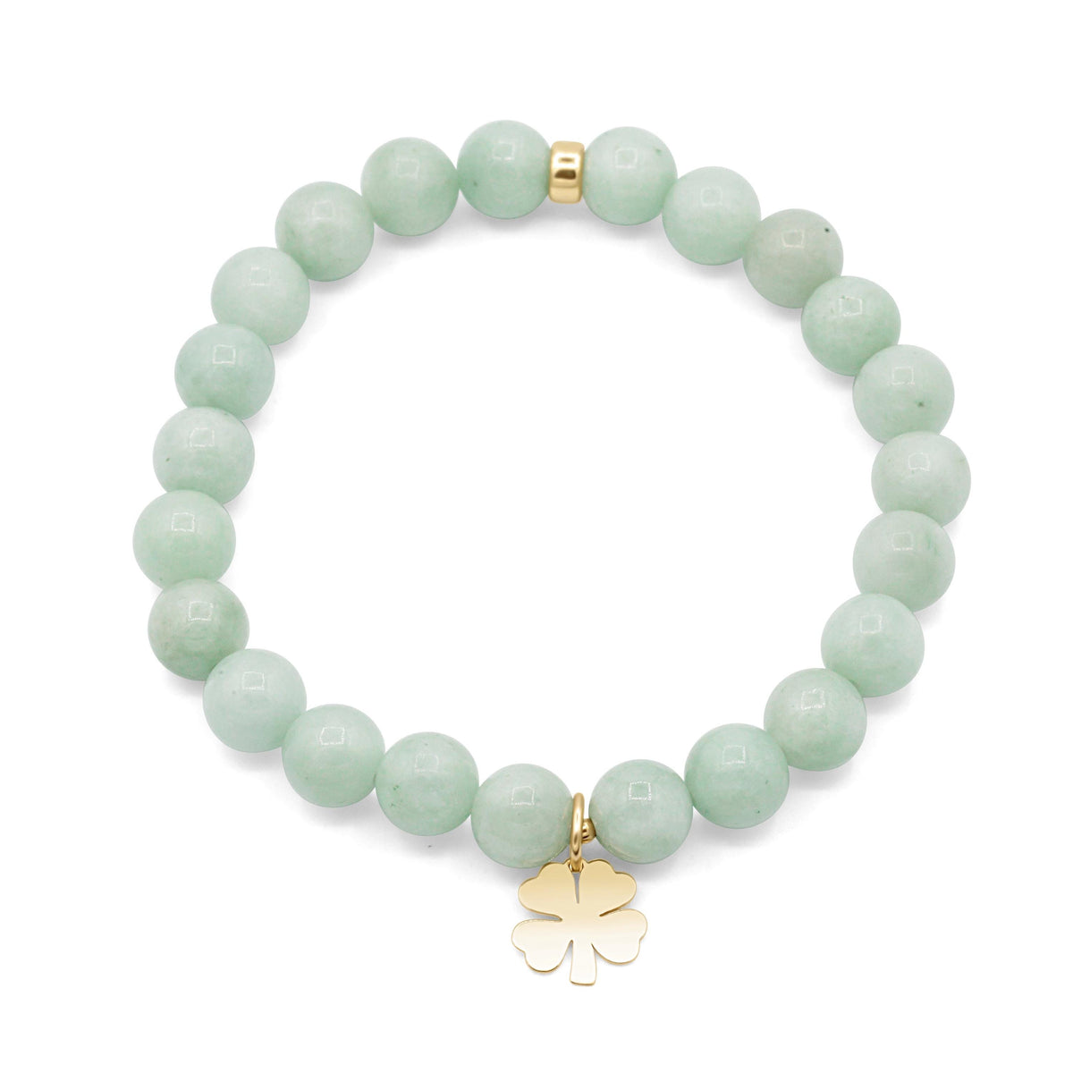 Jadeite Clover bracelet from Earthly Abundance featuring green jadeite beads and a clover charm on an elastic cord.