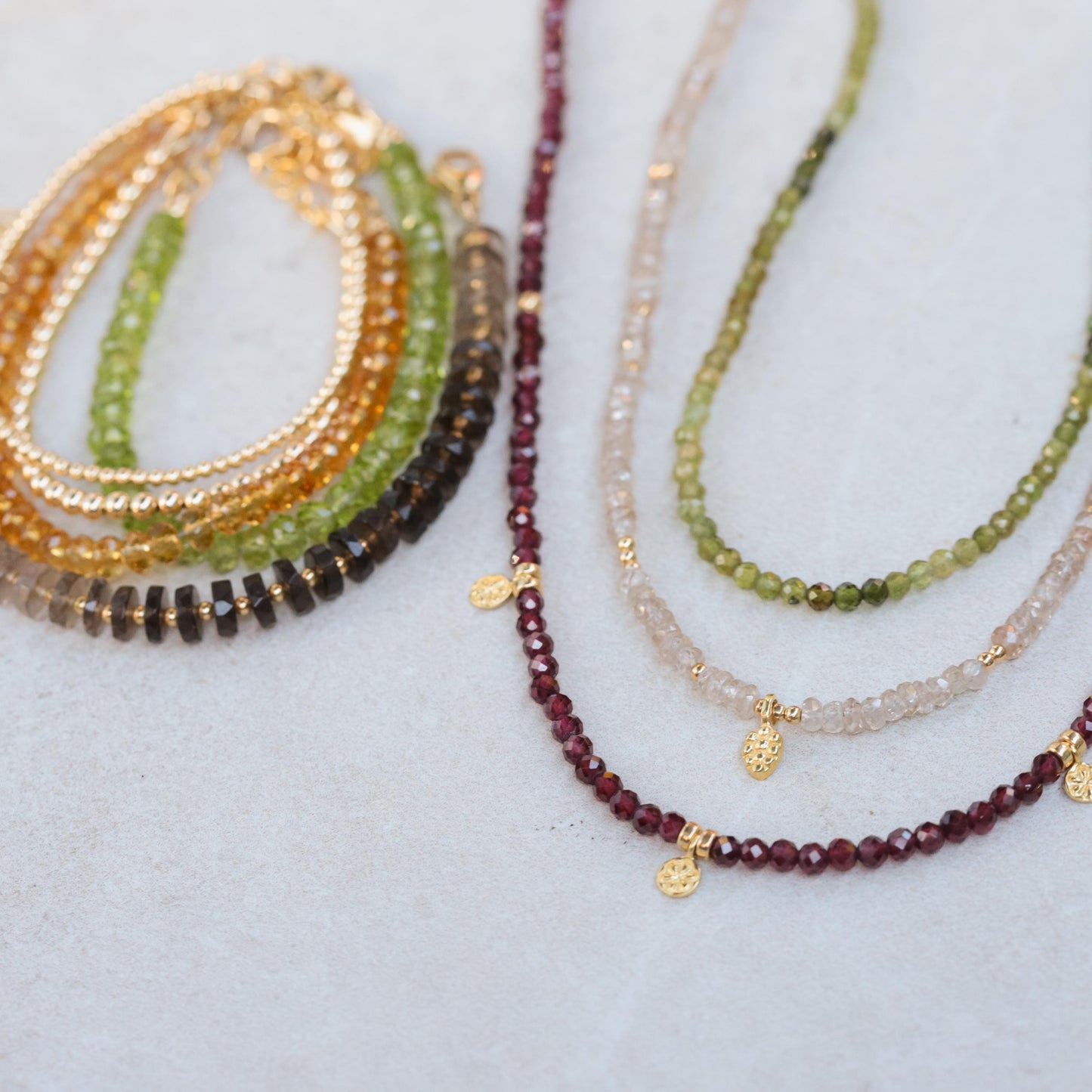 Earthly Abundance Timeless Radiance Zircon necklace featuring a delicate chain with sparkling zircon stones on a white background.