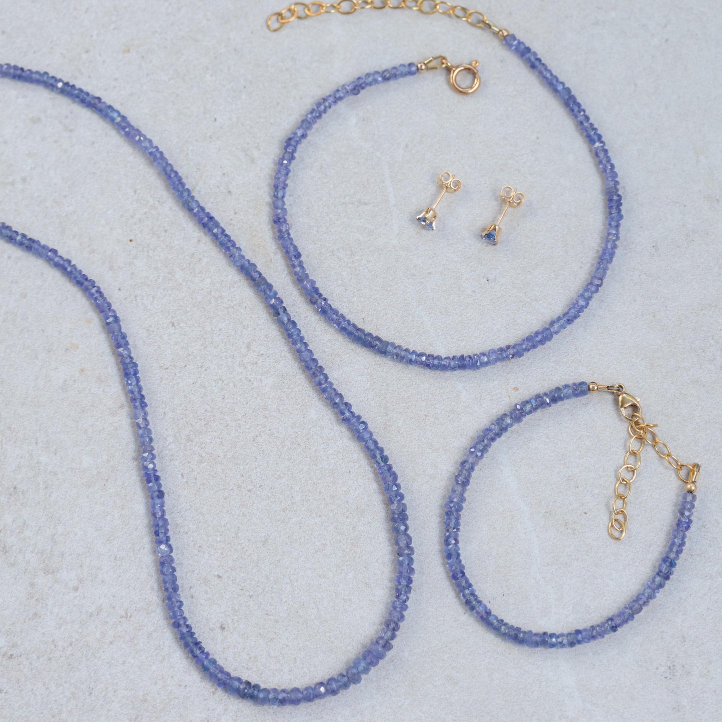 Higher Clarity Tanzanite Necklace from Earthly Abundance featuring a vibrant blue tanzanite pendant on a delicate chain.