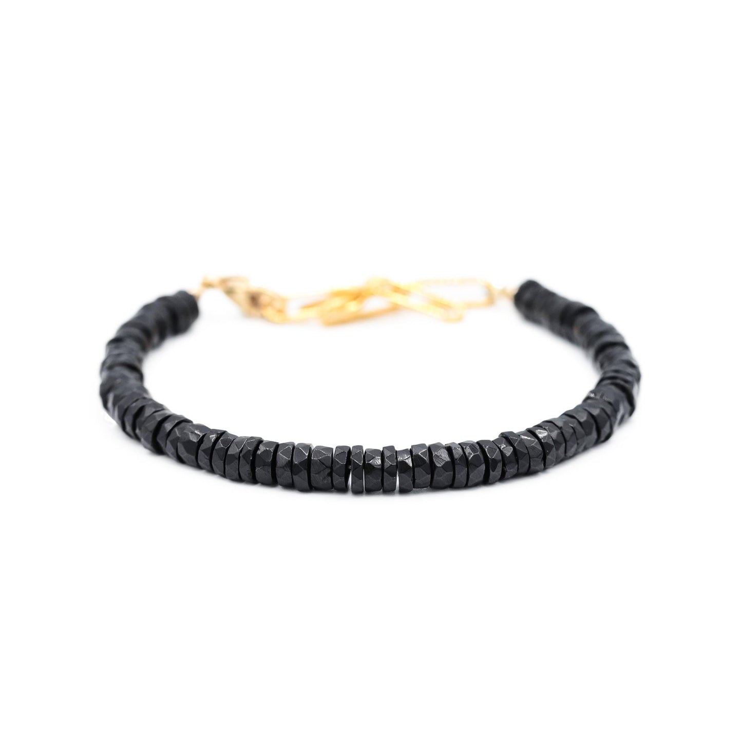 Black Spinel Paperclip Bracelet by Earthly Abundance featuring sleek black spinel stones and modern paperclip chain design.
