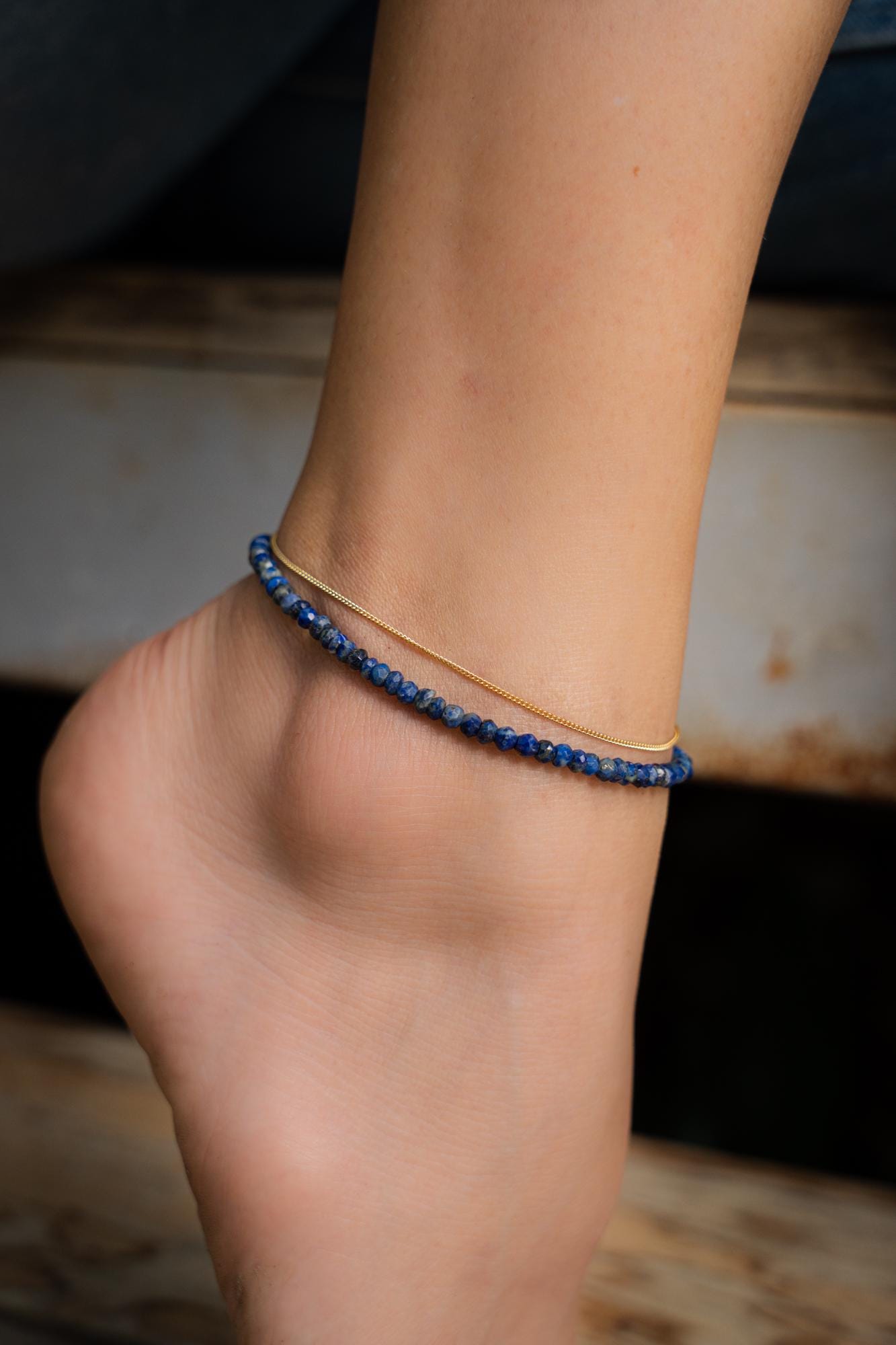 Lapis Lazuli anklet with 14K gold filled chain, featuring blue gemstone beads and intricate gold details from Earthly Abundance.